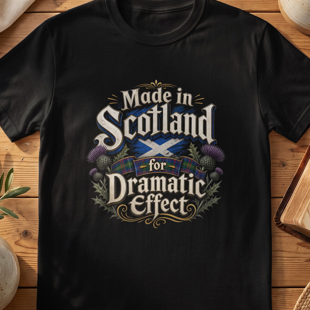 Black Gildan 64000 unisex T-shirt flatlay with Made in Scotland for Dramatic Effect Thistle Scottish graphic design