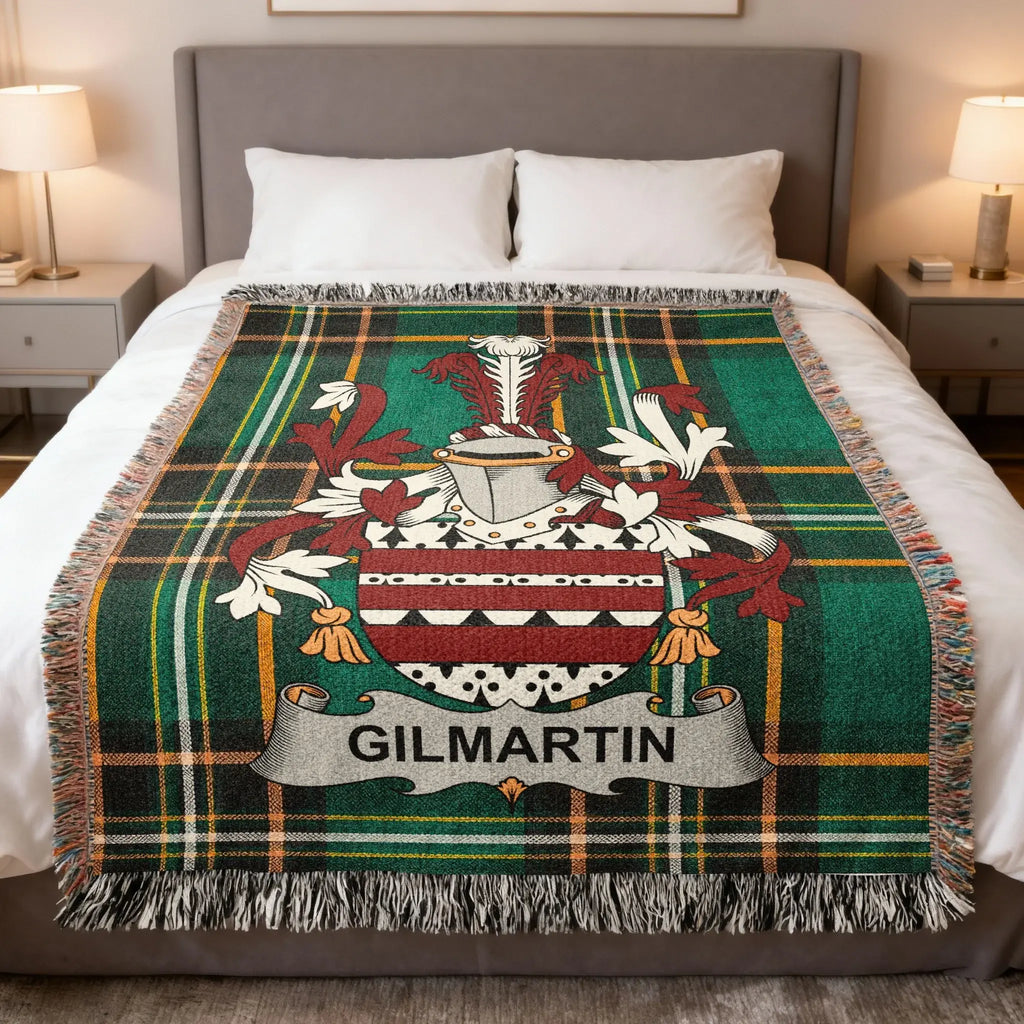 Green tartan blanket with GILMARTIN crest and name.