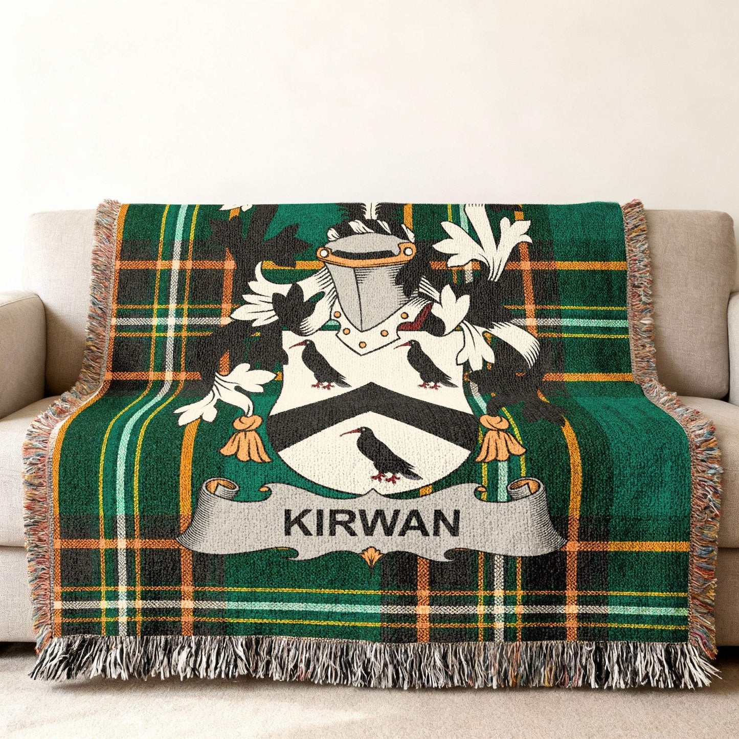 Kirwan family crest on a green tartan throw blanket.