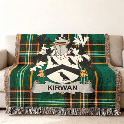 Kirwan family crest on a green tartan throw blanket.