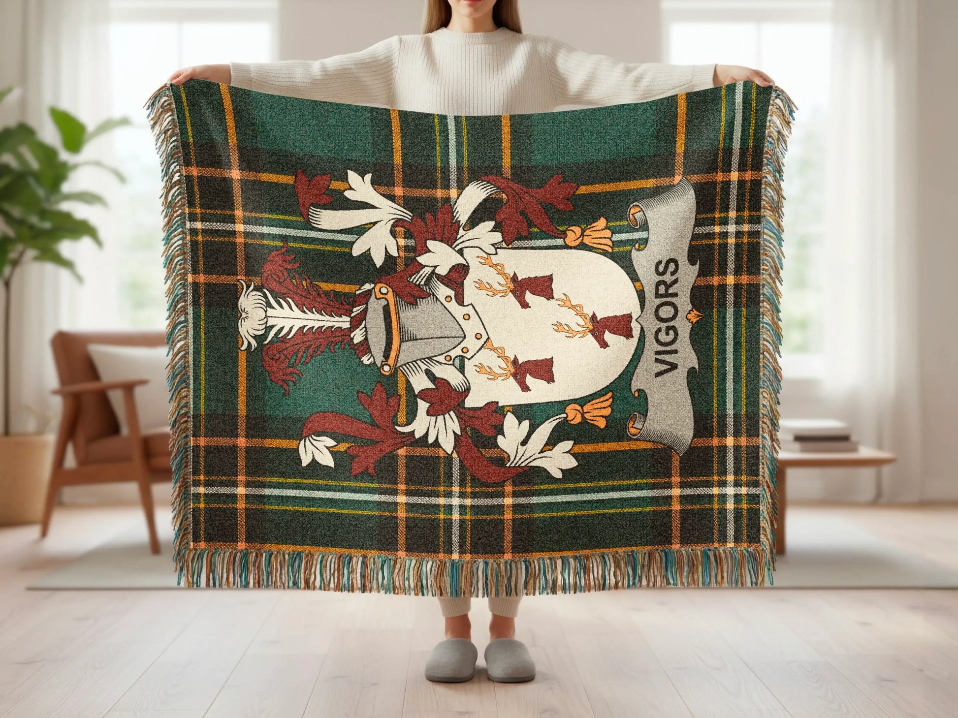 Green tartan throw blanket with the VIGORS crest.