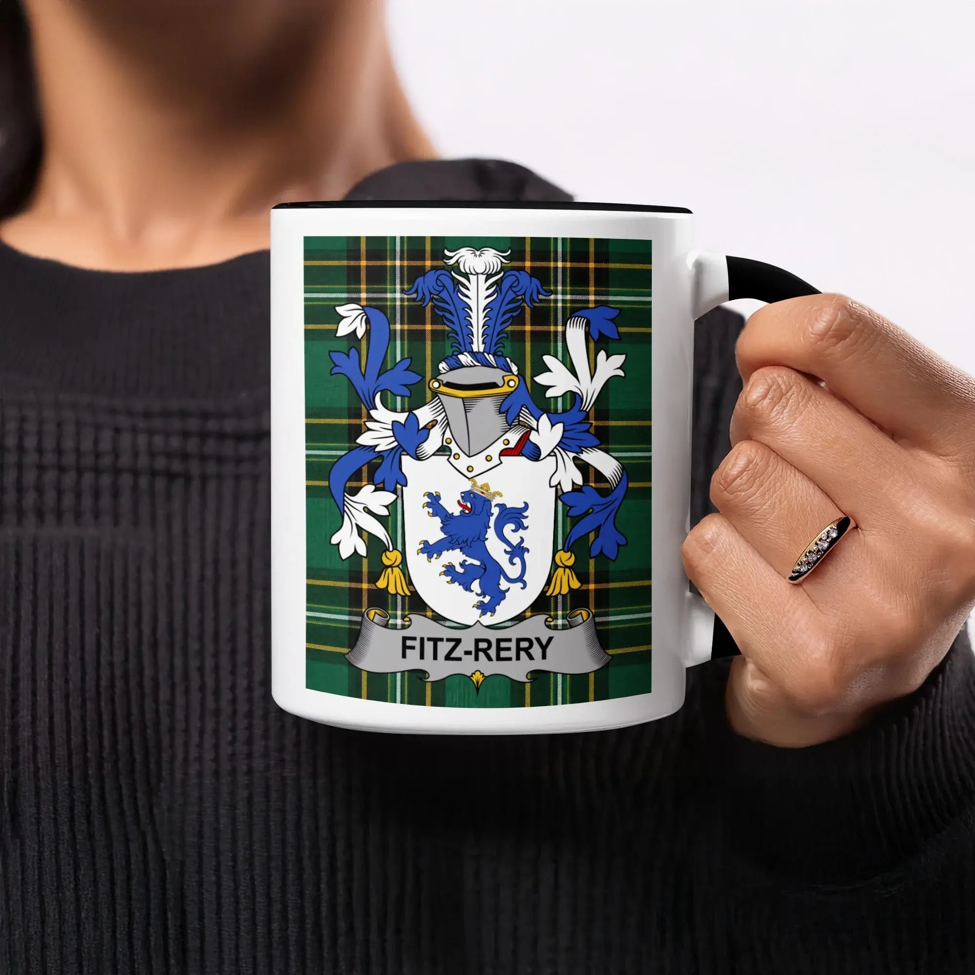Mug with Fitz-Rery family crest on plaid background.