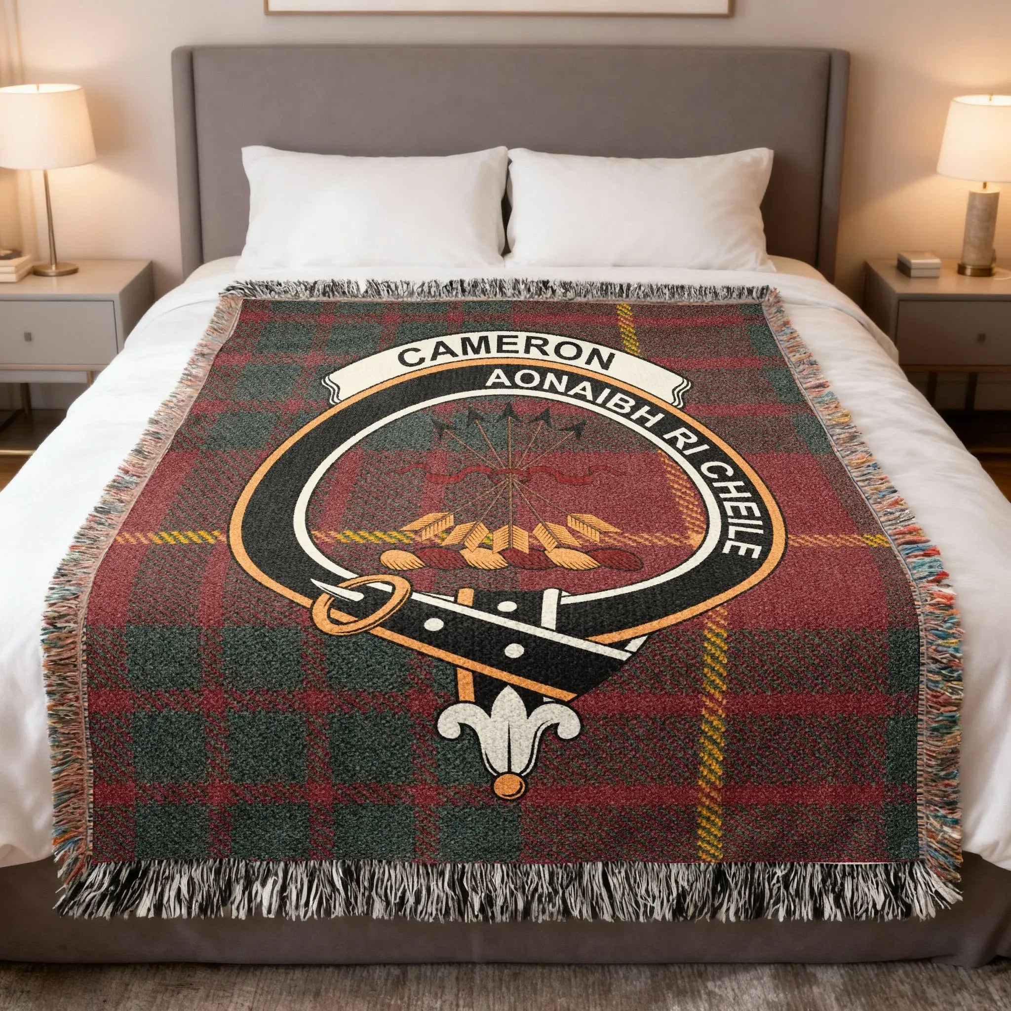 Cameron clan tartan woven blanket on sofa — 100% cotton with red plaid and clan crest