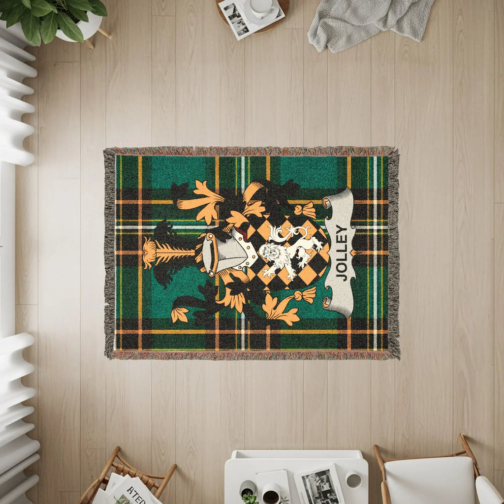 Green and gold plaid throw blanket with Jolley family crest.