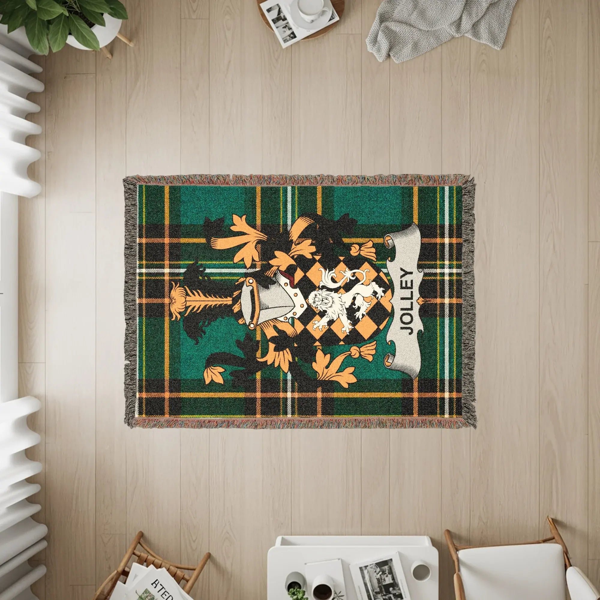Green and gold plaid throw blanket with Jolley family crest.