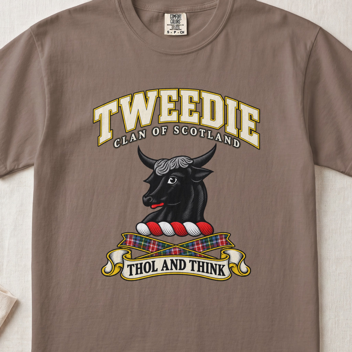 Tweedie Scottish clan T-shirt in Espresso, front view with a black bull head and motto design.