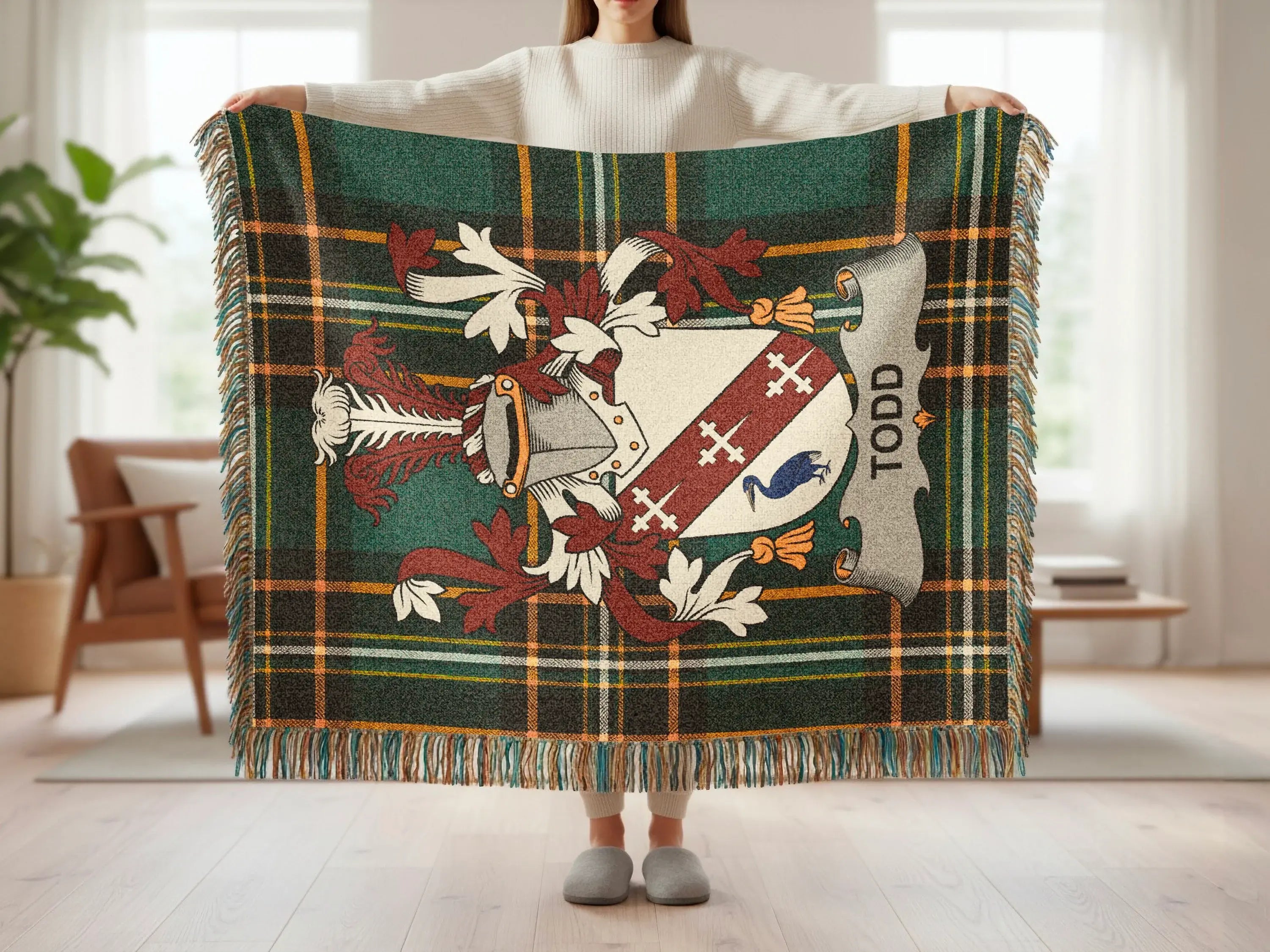 Tartan blanket with a coat of arms and "Todd" text.