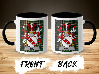 Two mugs side-by-side, each with the Ring family crest on a plaid background.