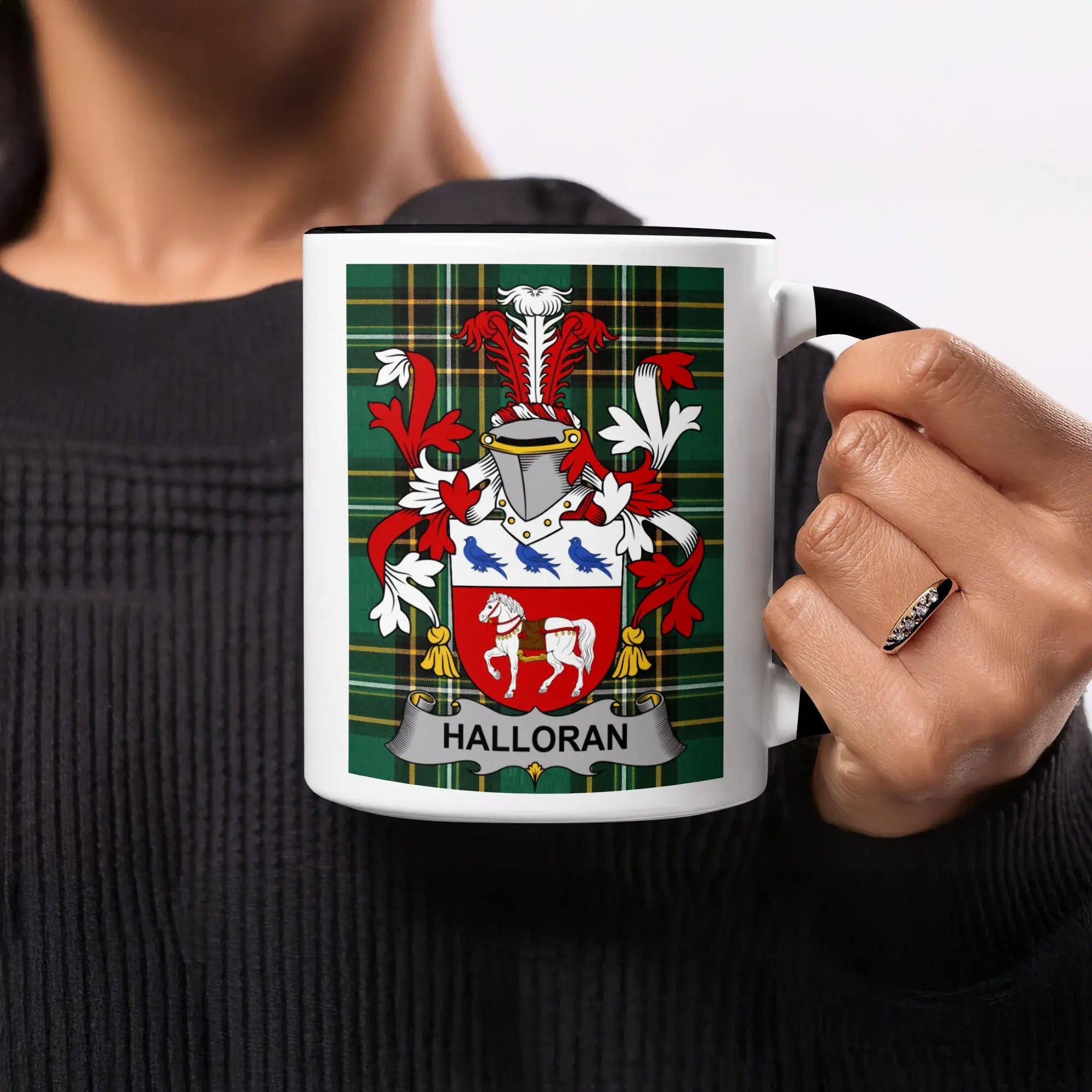 Mug featuring Halloran family crest on tartan background.
