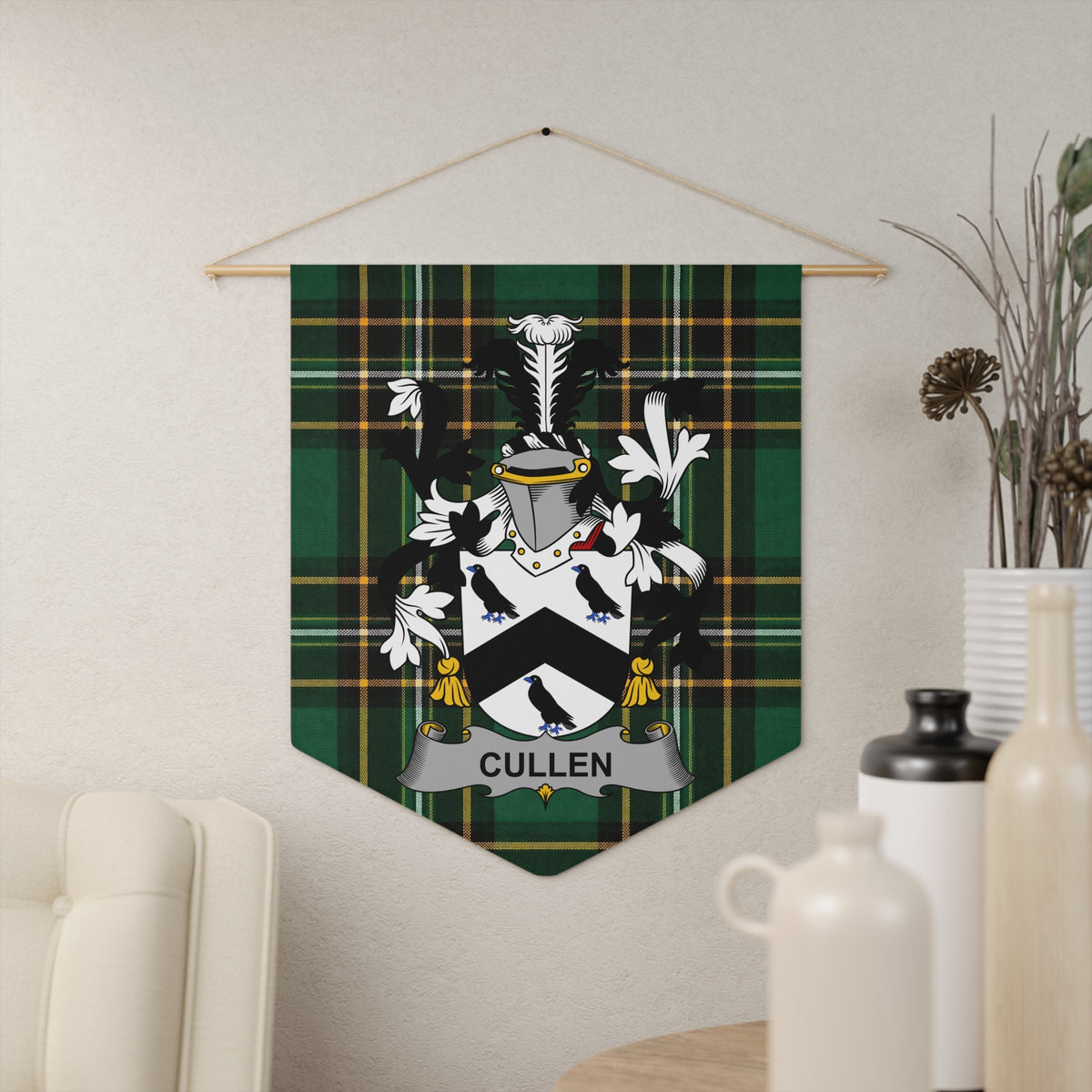 Cullen family crest on a green tartan banner hangs on a wall.