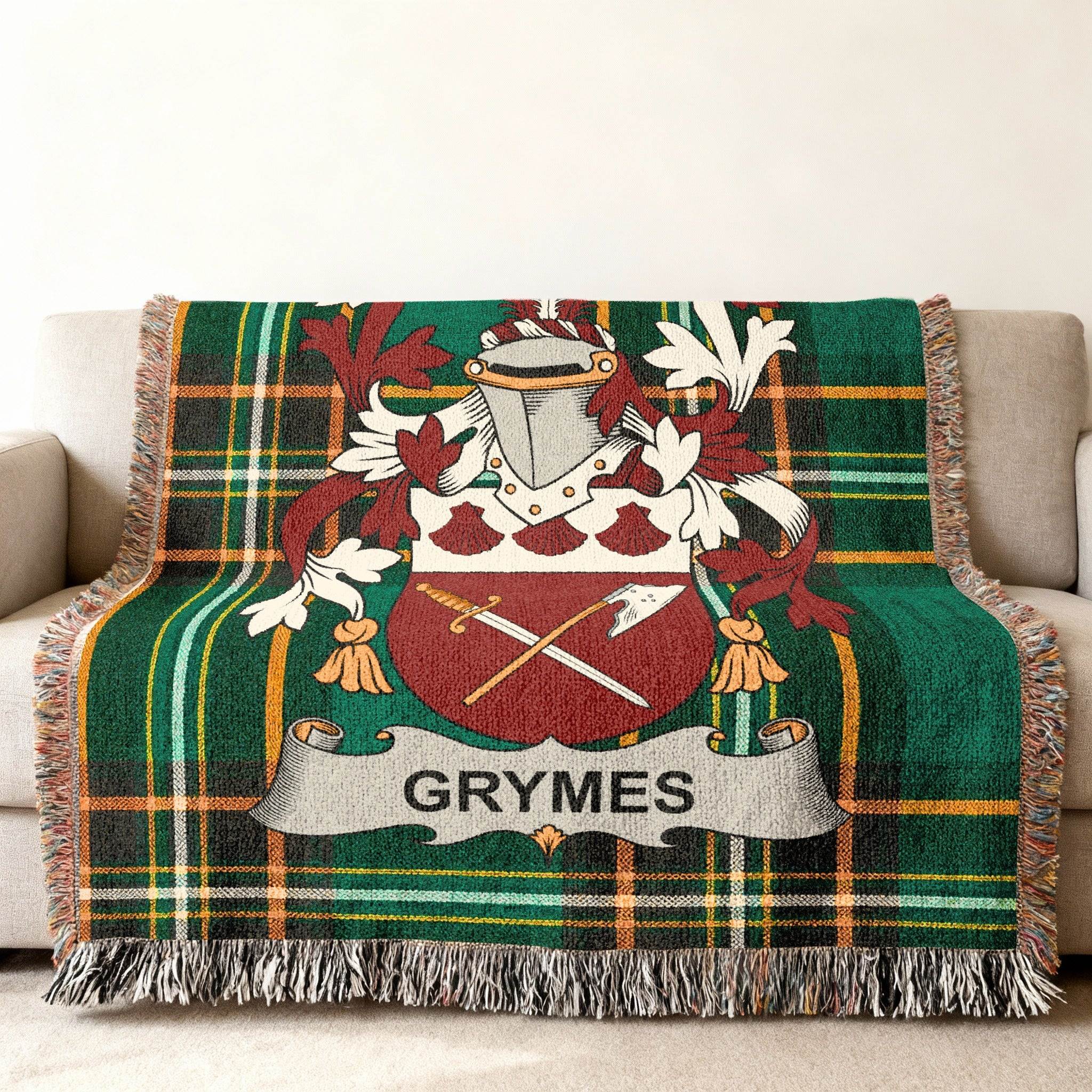 Green plaid throw blanket with the GRYMES family crest.