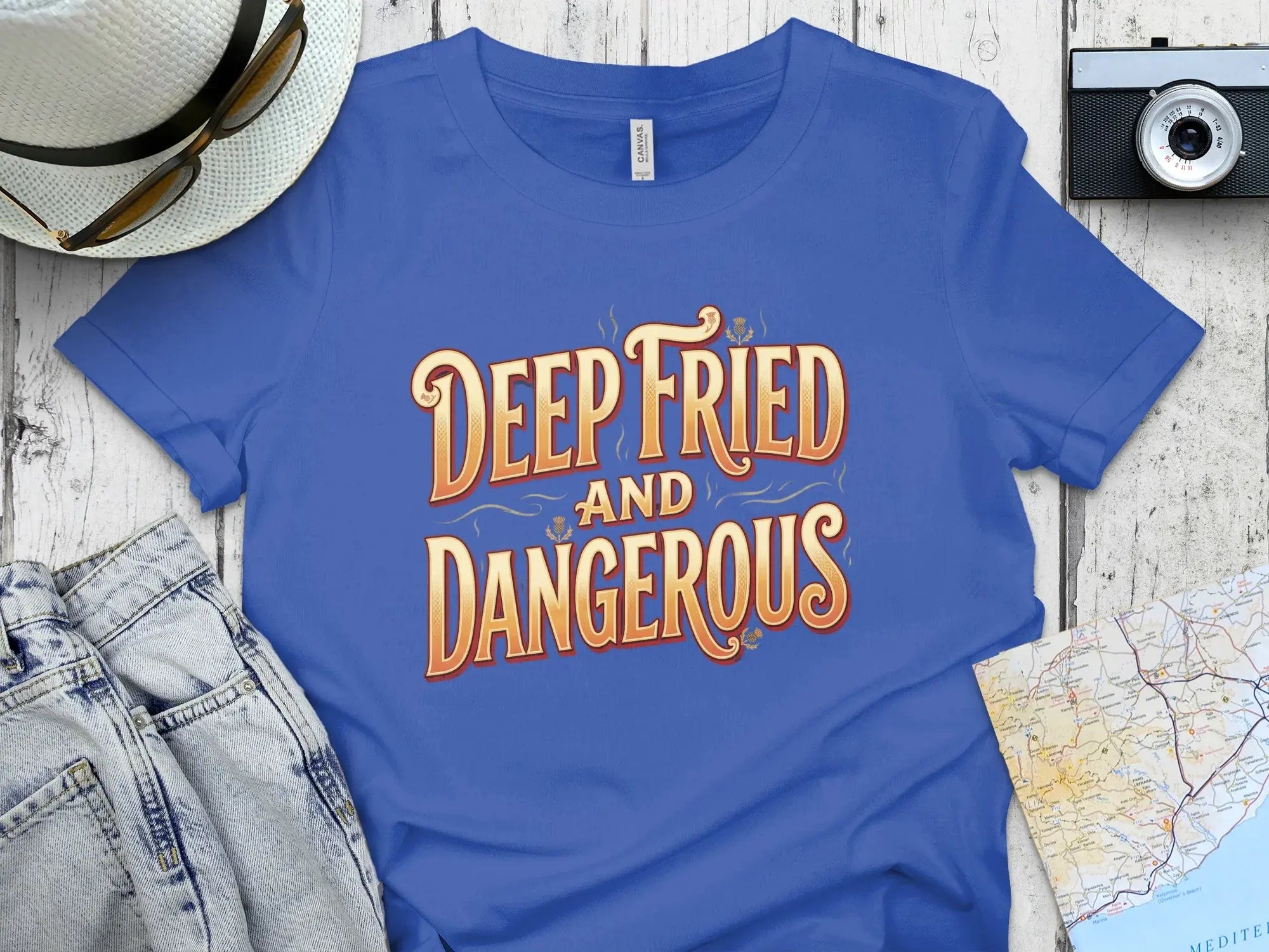 Blue t-shirt with "Deep Fried and Dangerous" text and a vintage map.