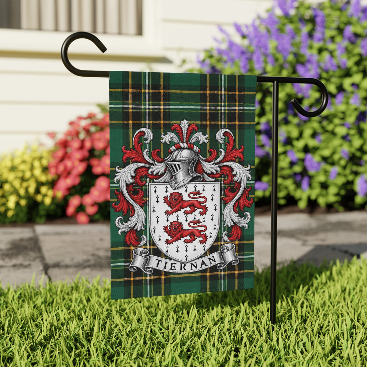 Tiernan Irish family crest garden flag on Irish National Tartan, garden view