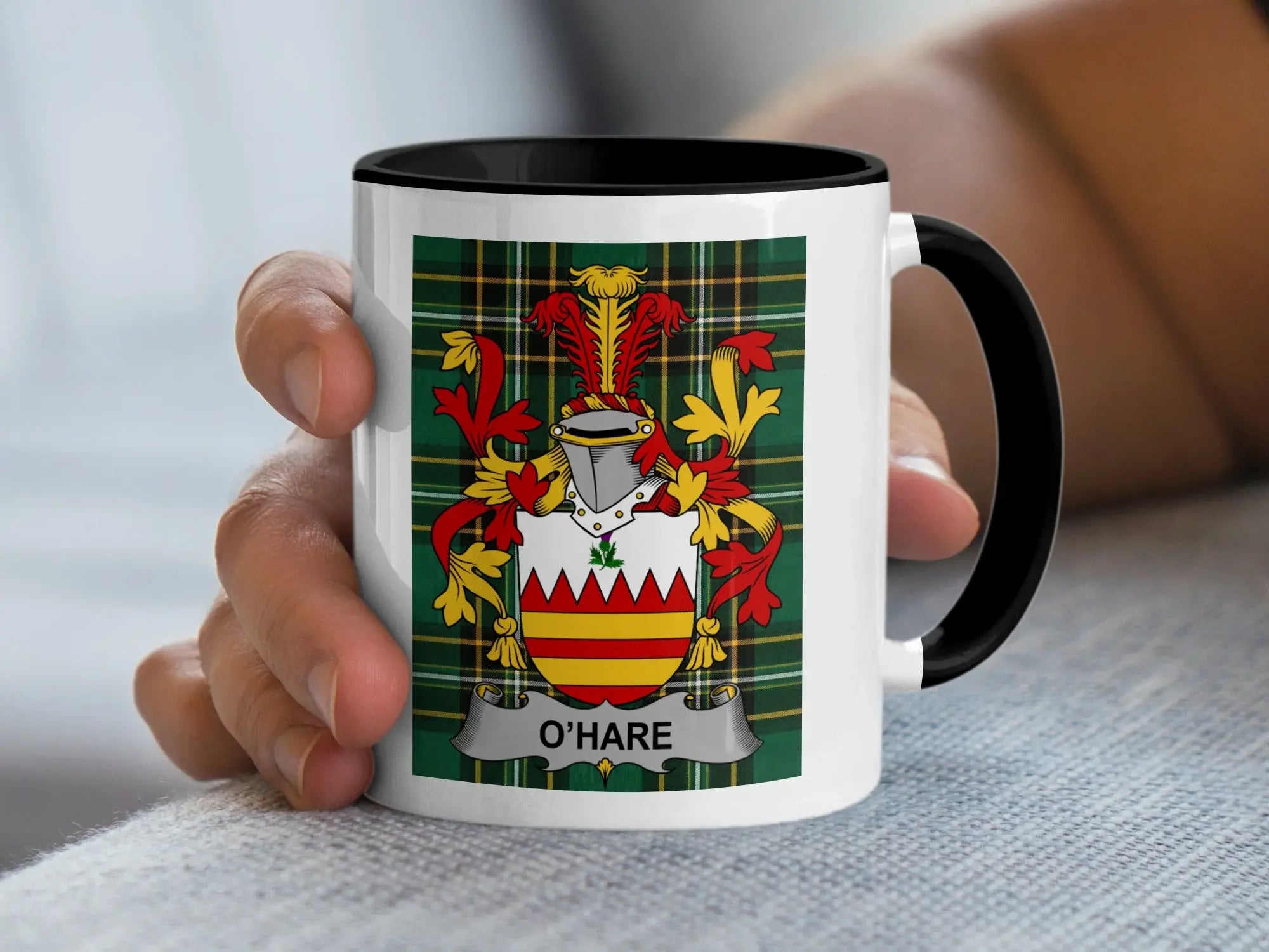 Mug with O'Hare family crest on tartan background.