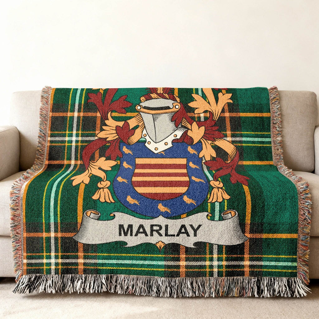 Green tartan blanket with a coat of arms and "MARLAY" banner.