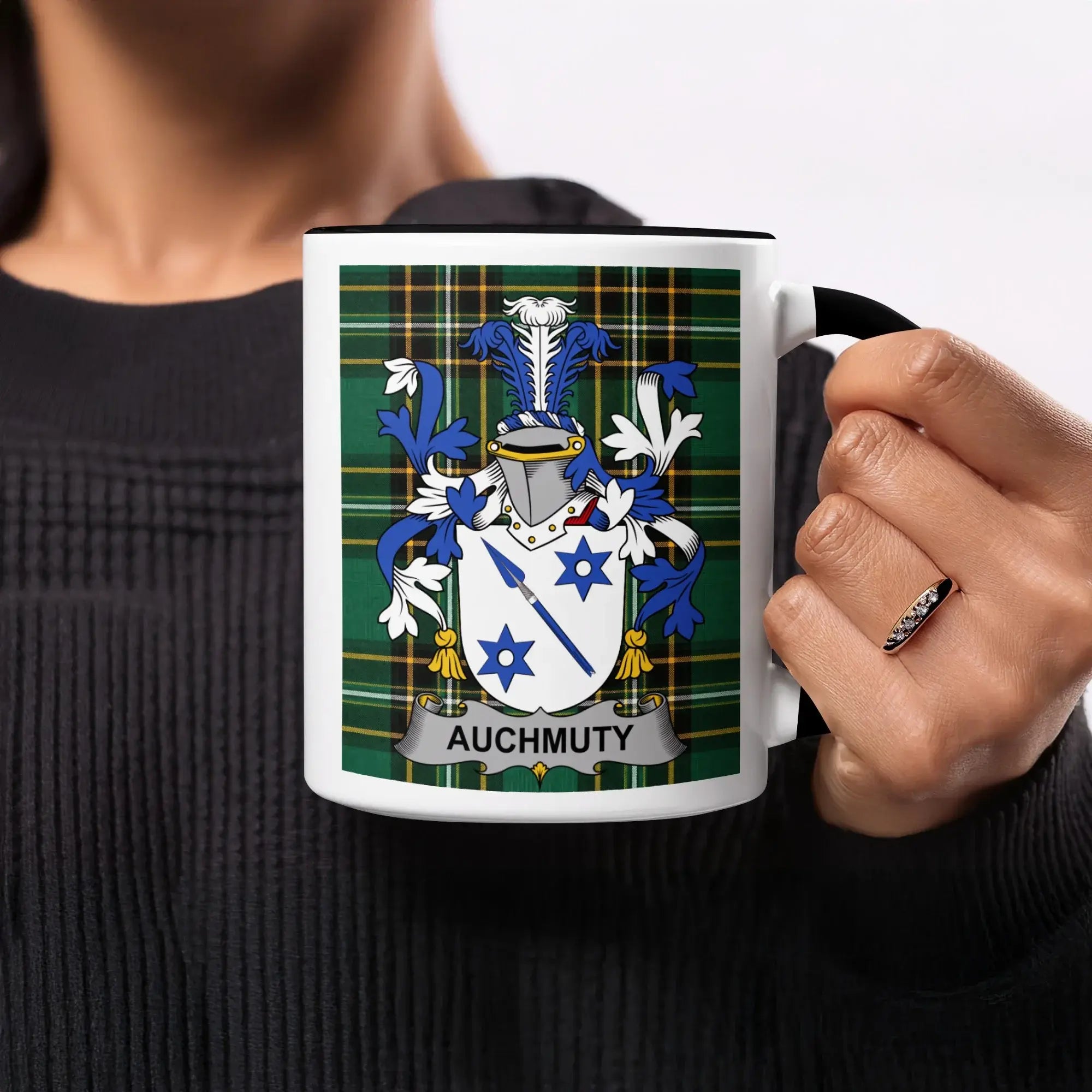 Mug with AUCHMUTY family crest on tartan pattern.