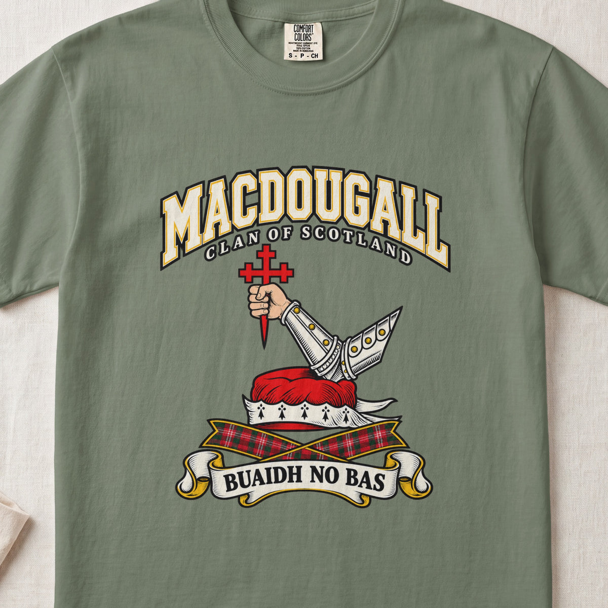 MacDougall graphic T-shirt in Moss green, front flat lay showing varsity lettering and bent arm in silver armour holding a pointed red cross.