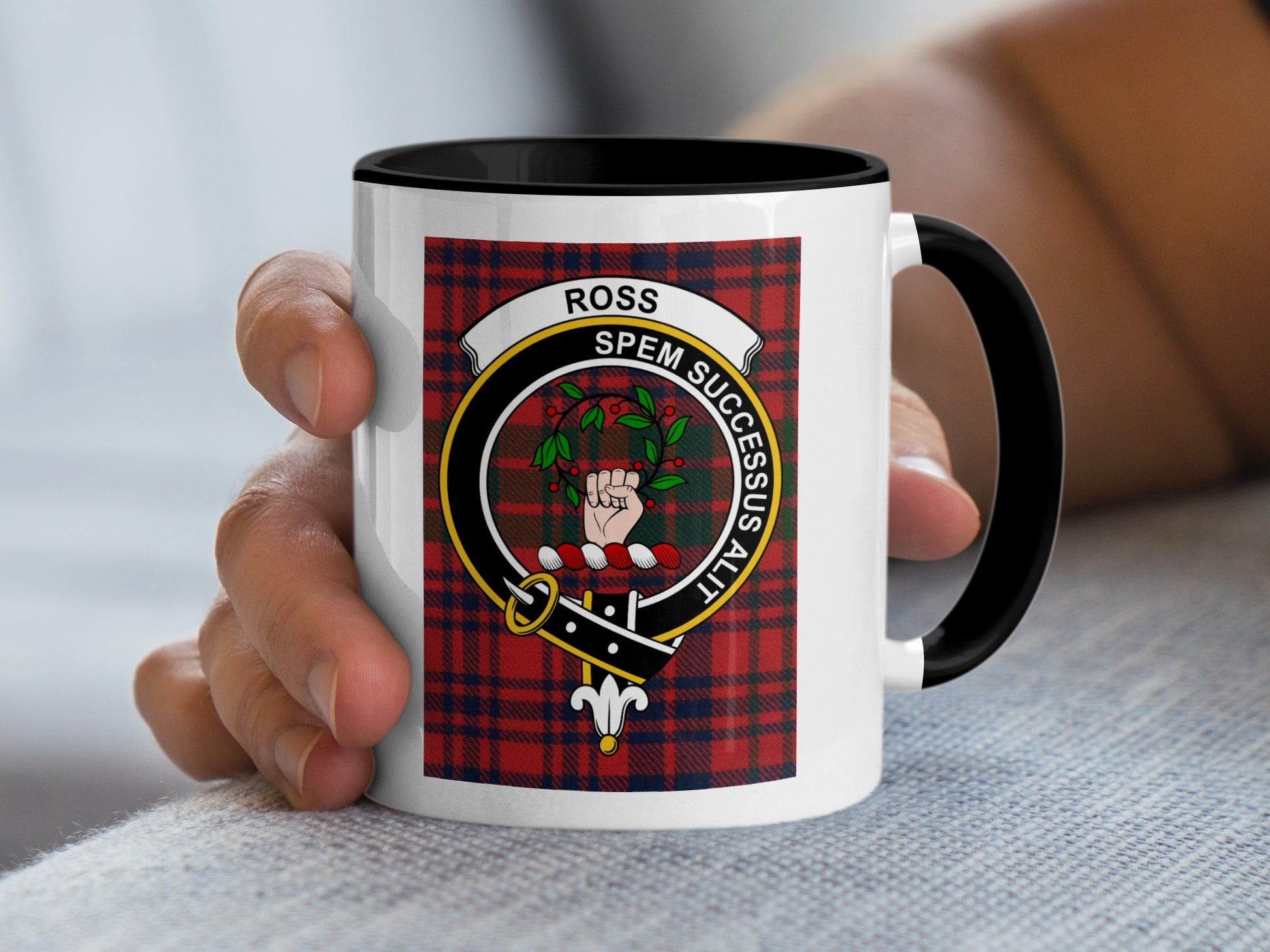 White mug with black rim featuring the Ross tartan and clan crest.