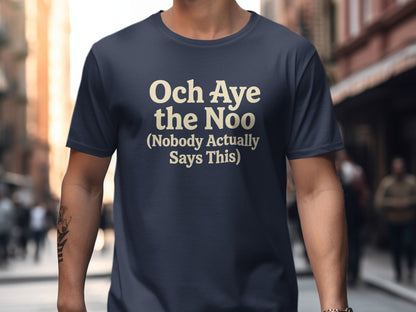 Dark blue t-shirt with "Och Aye the Noo (Nobody Actually Says This)" text.