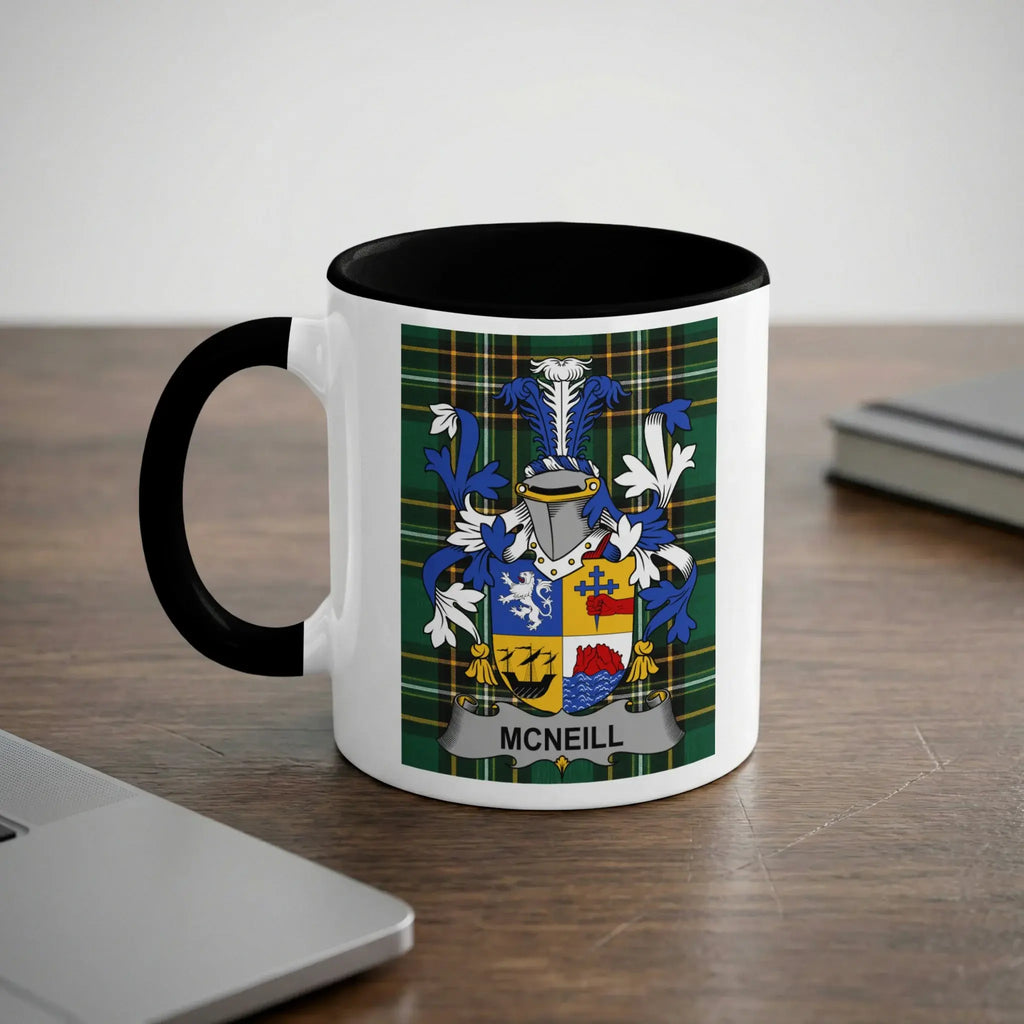 White mug with black rim featuring the McNeill clan crest on a tartan background.