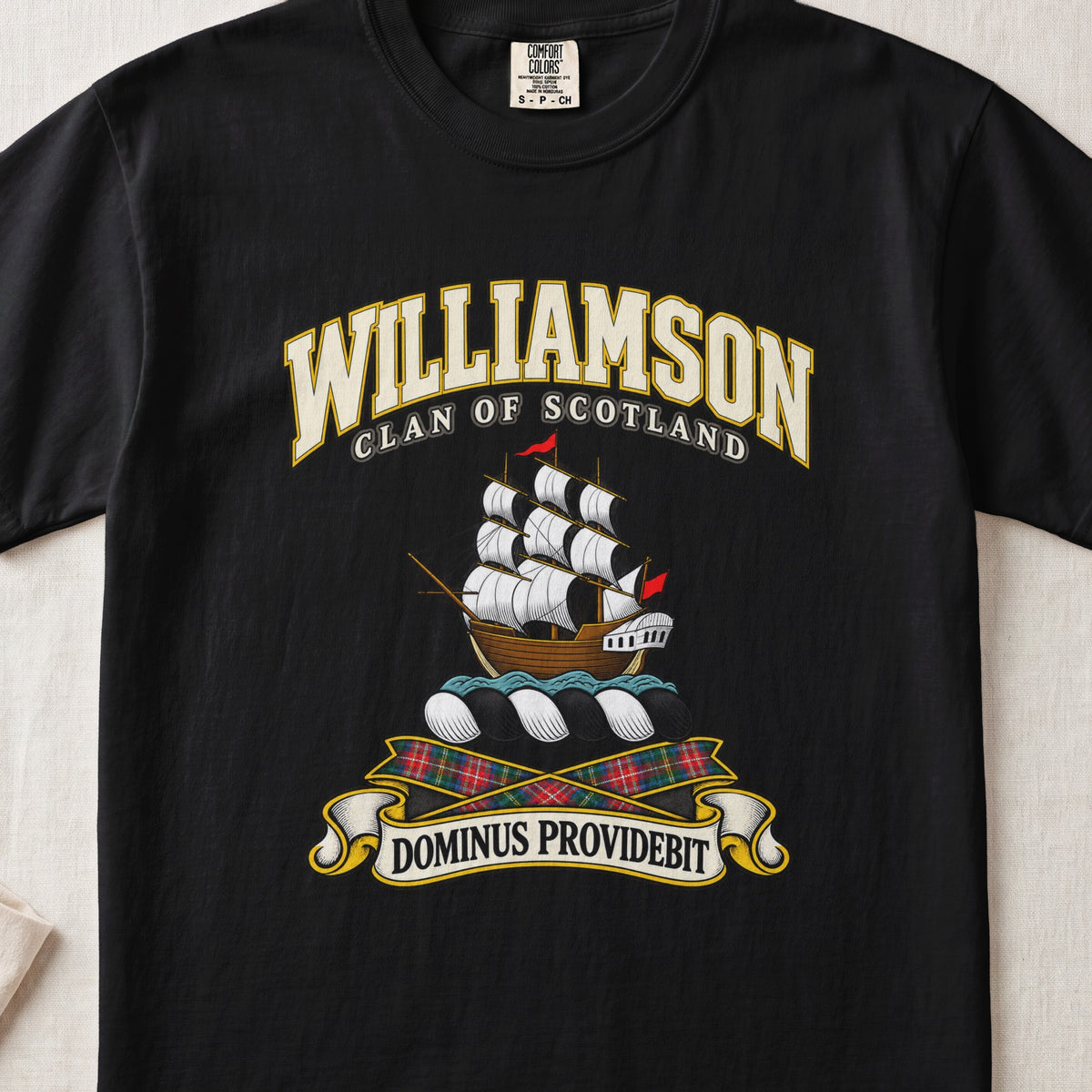 Williamson Scottish clan T-shirt in Black, front view with a sailing ship with white sails and motto banner.
