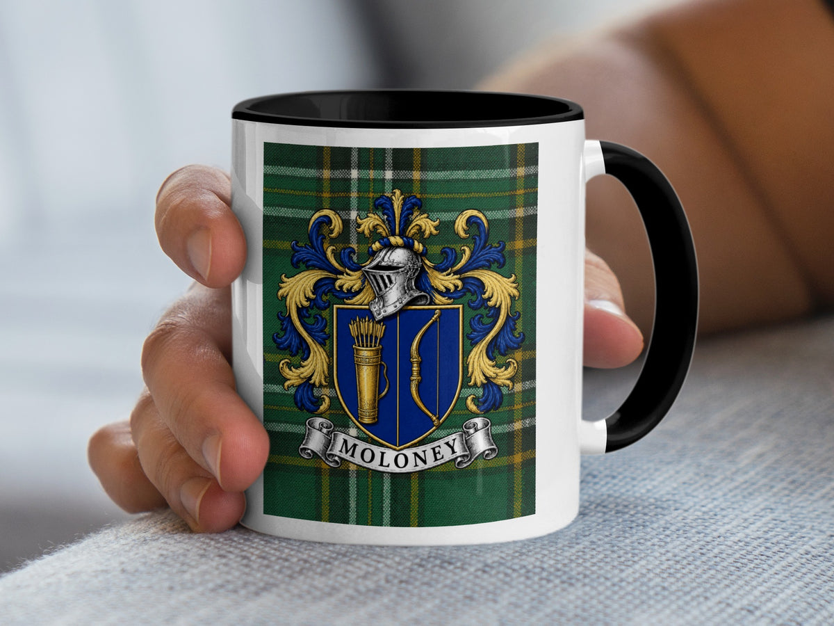 Moloney Irish family crest mug with black accents and Irish National Tartan, lifestyle view
