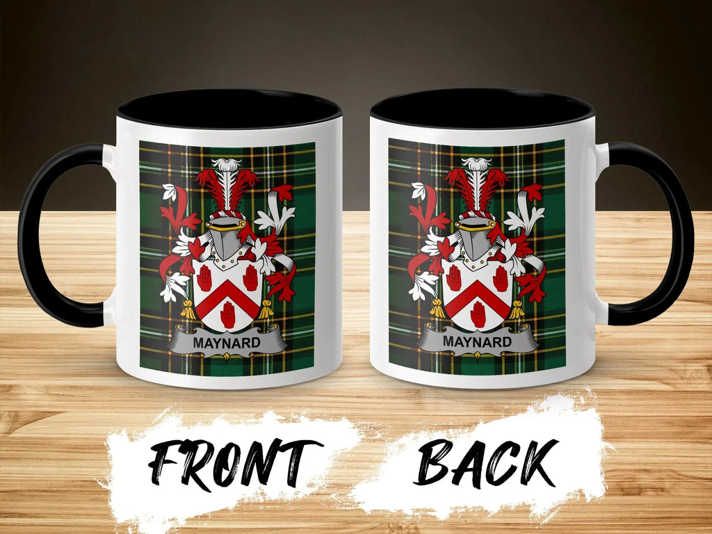 Two white mugs with black handles, displaying a coat of arms and the text "MAYNARD".