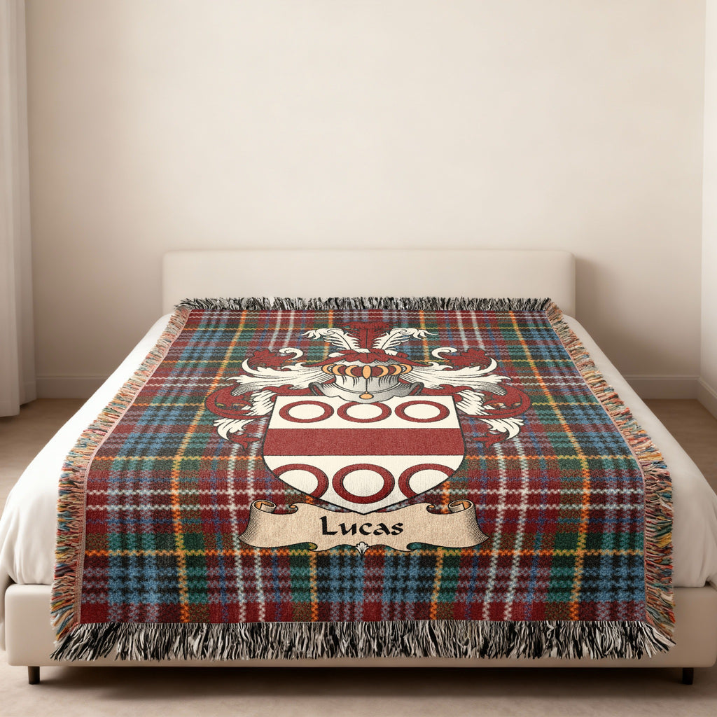 Lucas Scottish family shield woven blanket on a Caledonia tartan background
