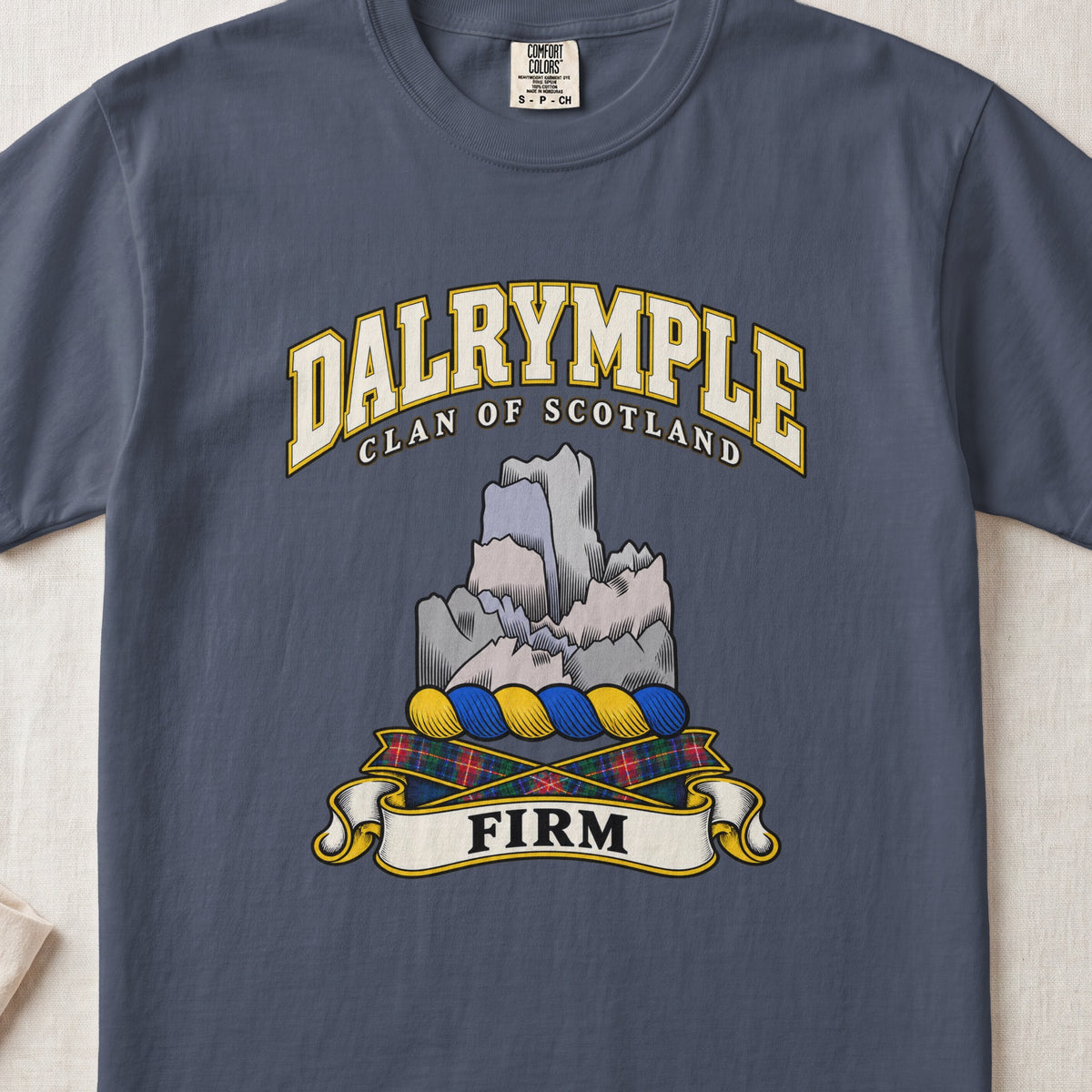 Dalrymple Scottish clan T-shirt in Midnight, front view with a gray rock formation and motto design.