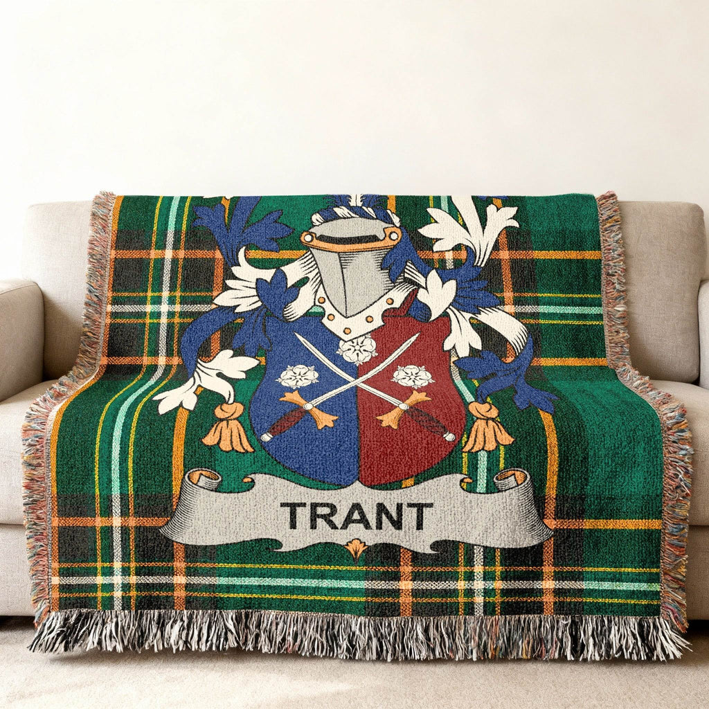 Tartan blanket with the Trant family crest in the center.