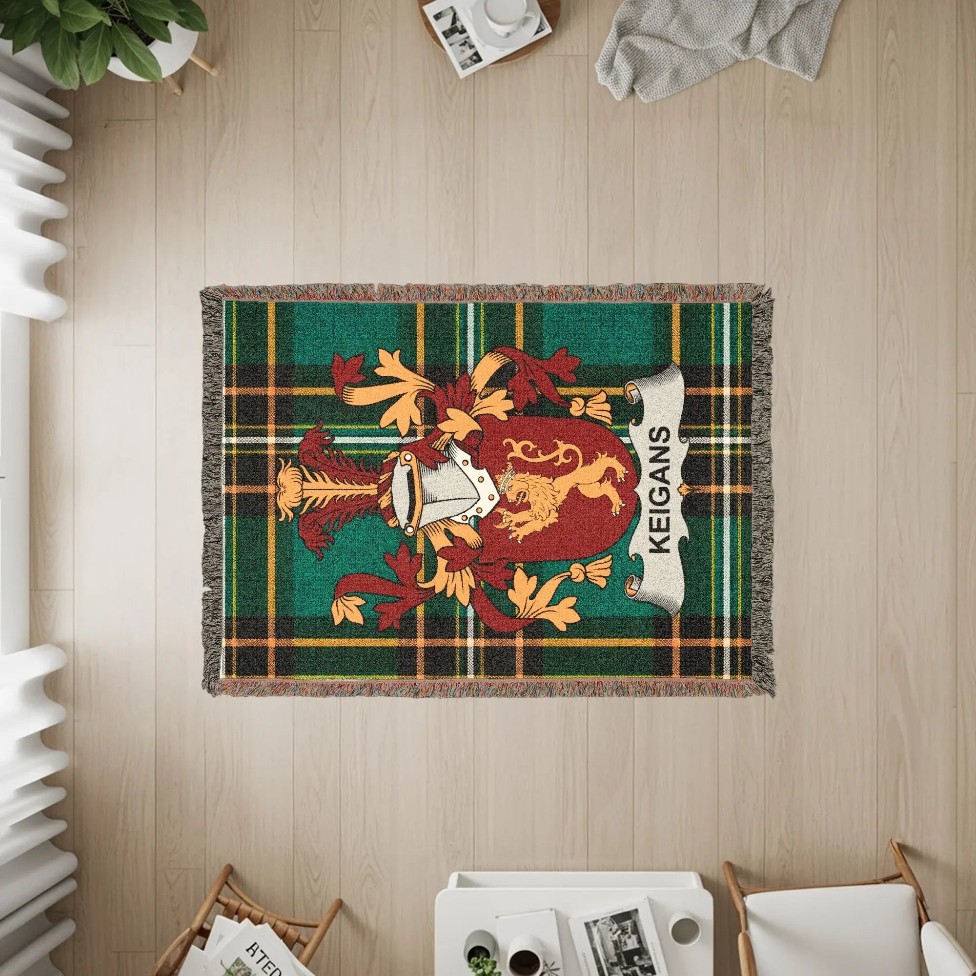 Keigans family crest in a tartan plaid pattern on a woven throw blanket.