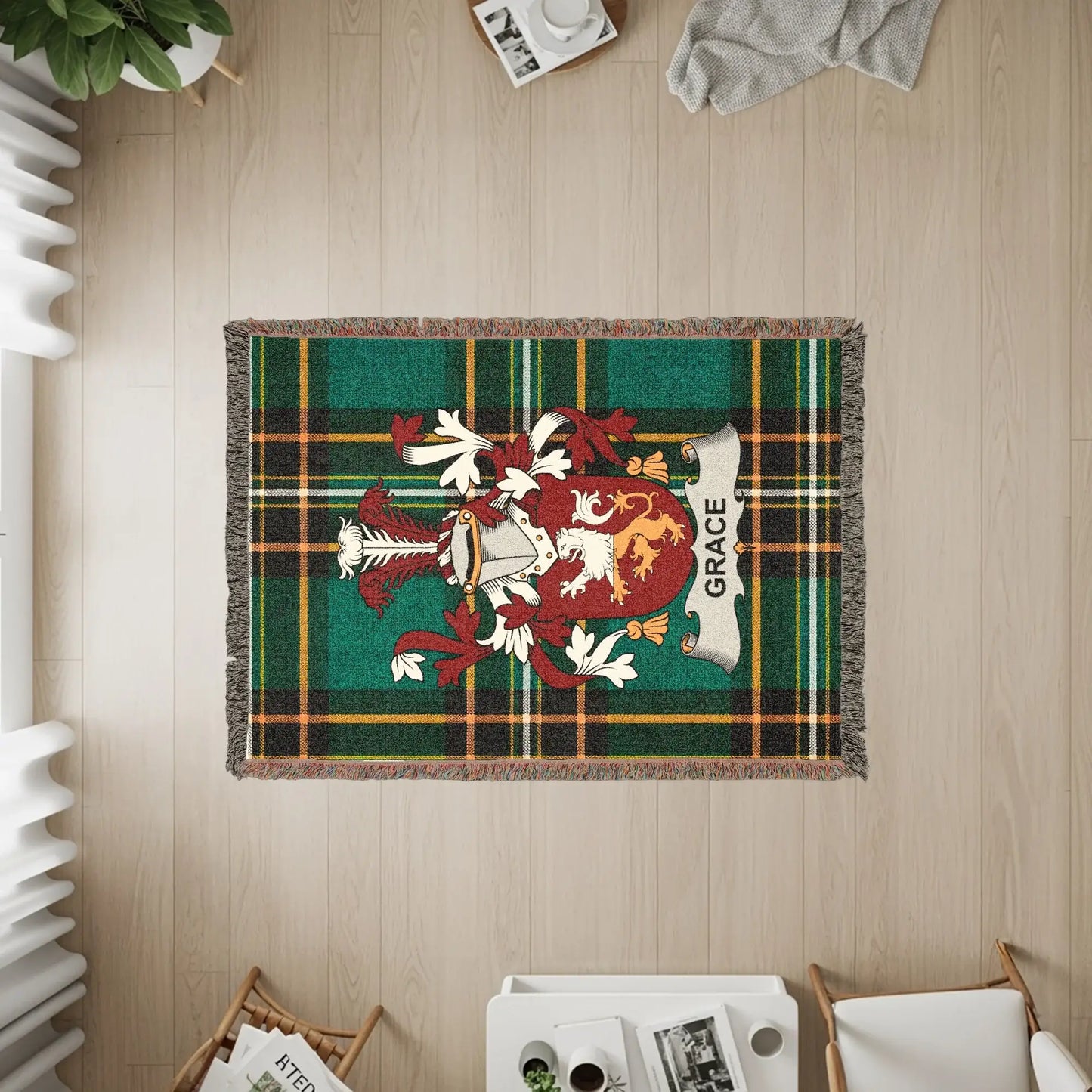Tartan throw blanket with a coat of arms and the name "Grace."