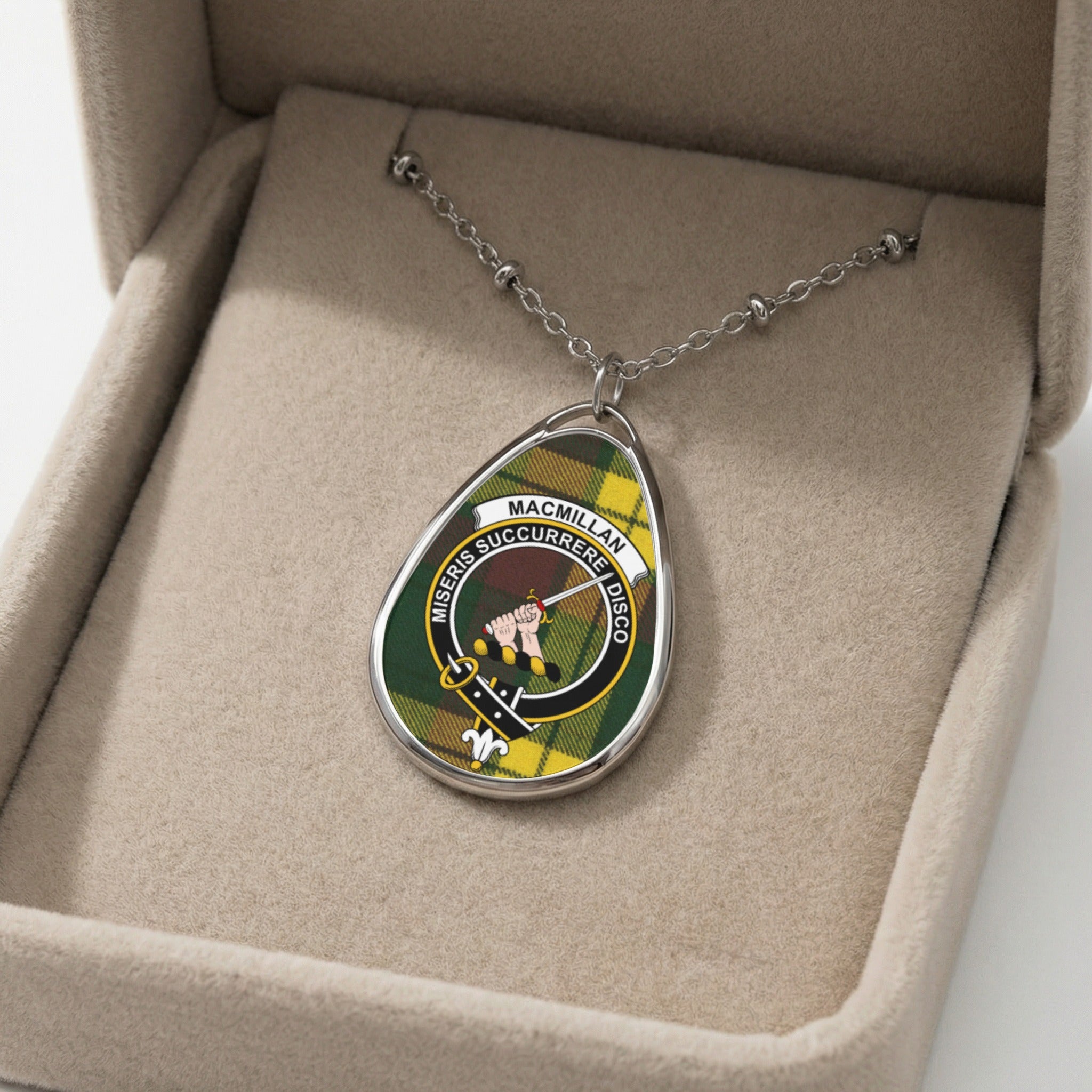 MacMillan clan crest pendant necklace with tartan pattern and motto in a box.