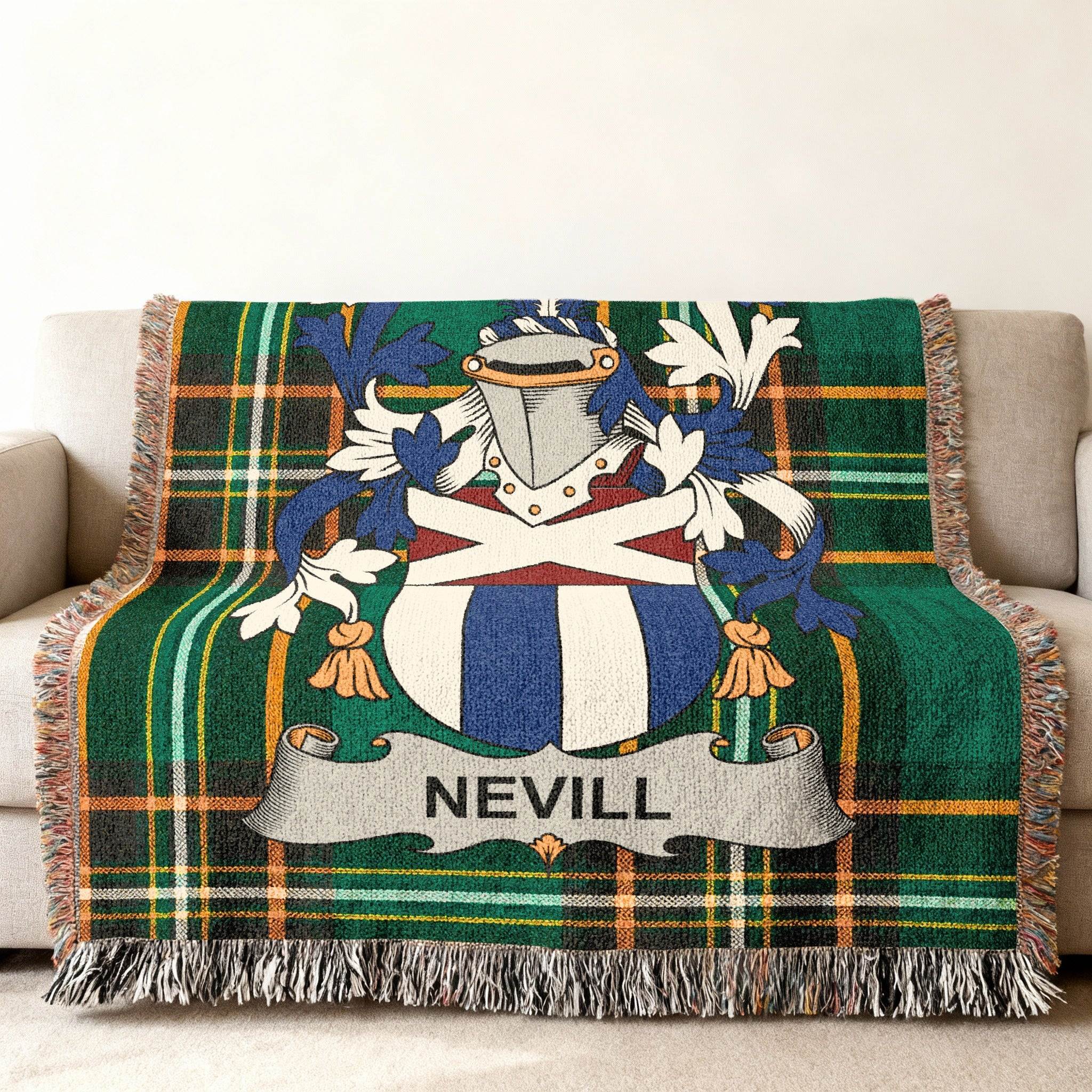 Green plaid throw blanket with Nevill family crest.