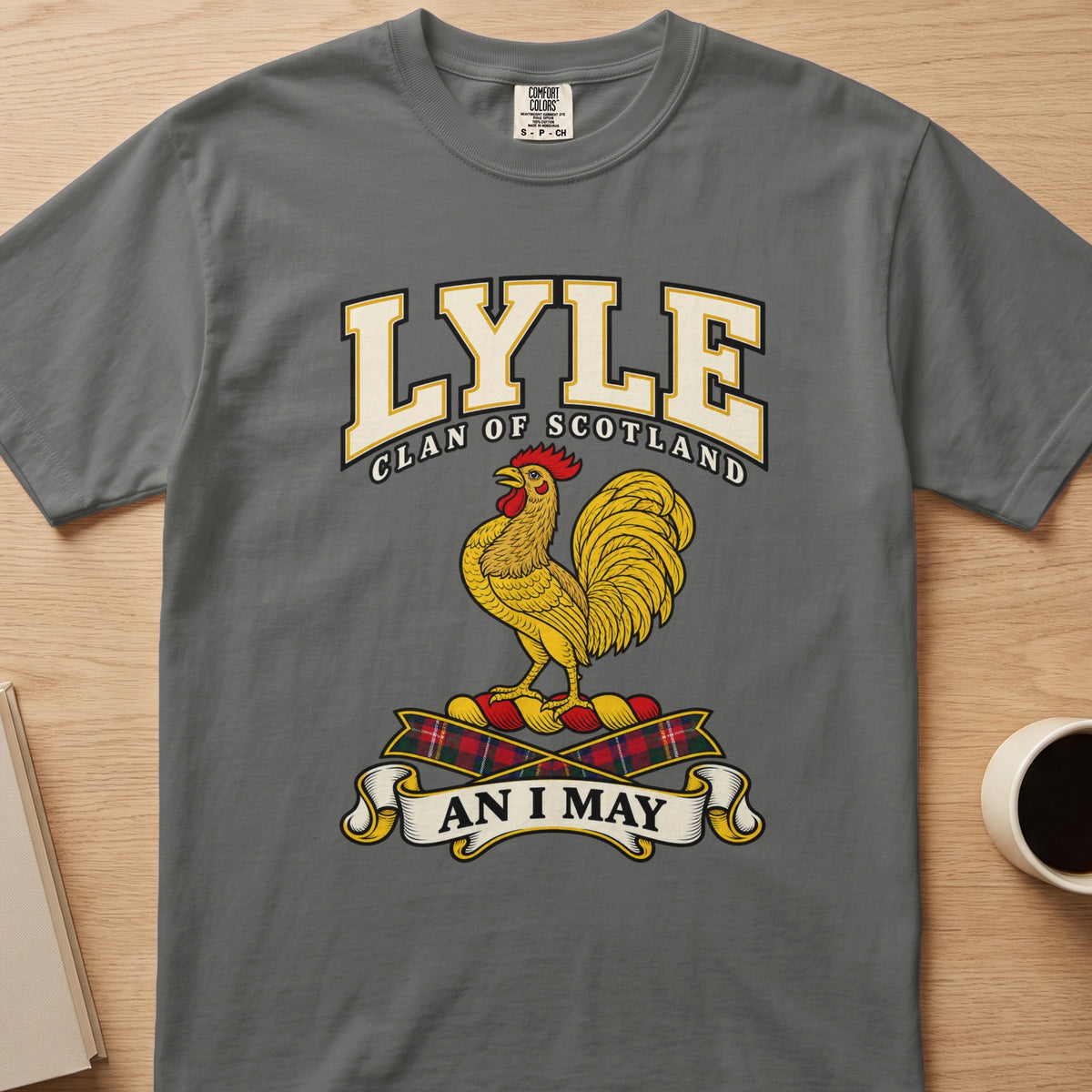 Lyle clan crest with gold rooster on a gray Comfort Colors T-shirt, front view