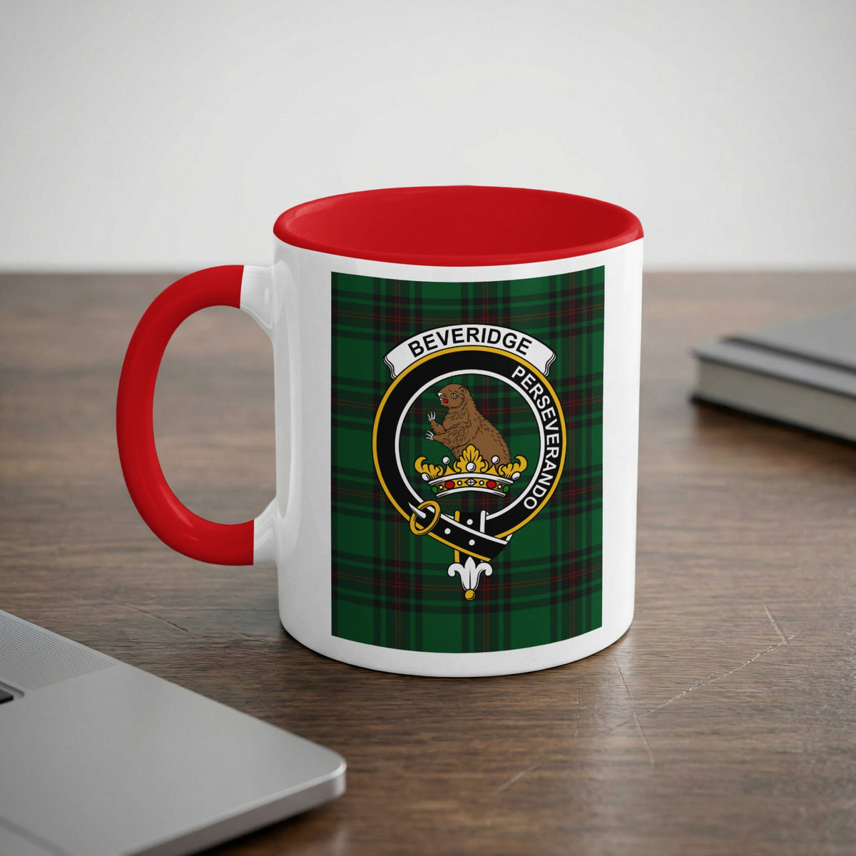 Beveridge Scottish family crest artwork on an 11 oz red accent mug with a tartan background