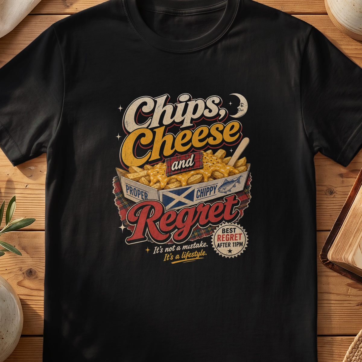 Black Gildan 64000 unisex T-shirt flatlay with Chips Cheese and Regret Scottish graphic design