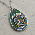 Kirkpatrick clan Scottish tartan necklace with clan crest and I Make Sure motto on tartan background