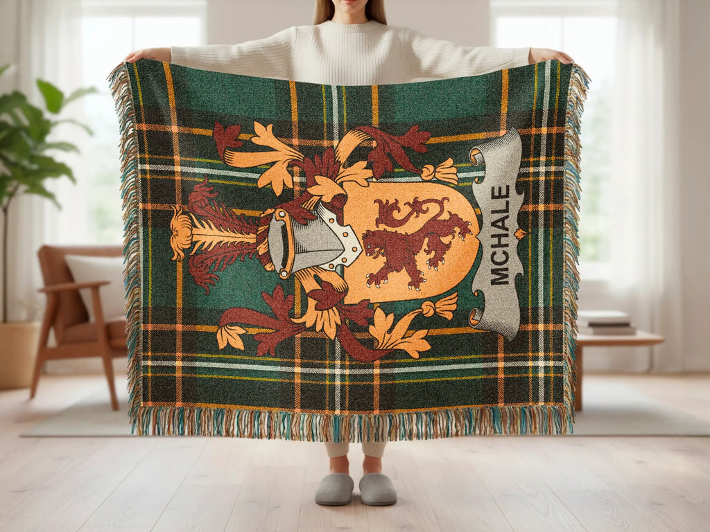 McHale tartan blanket with crest featuring a lion and heraldic shield.