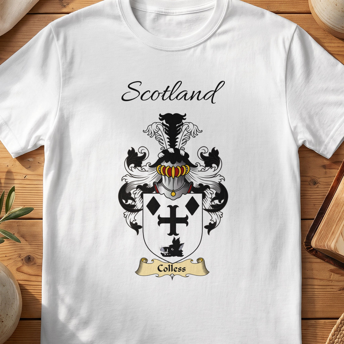 White Colless Scottish family shield T-shirt featuring a black cross and diamond motifs on white