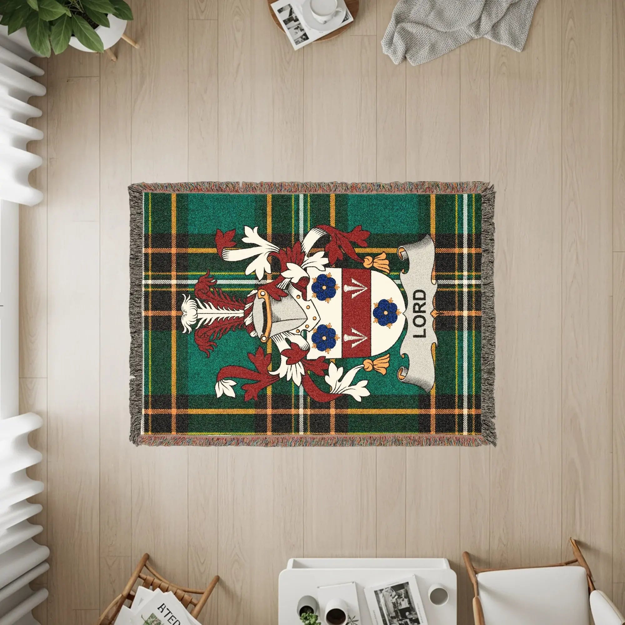 Tapestry blanket featuring the Lord family crest on a green tartan background.