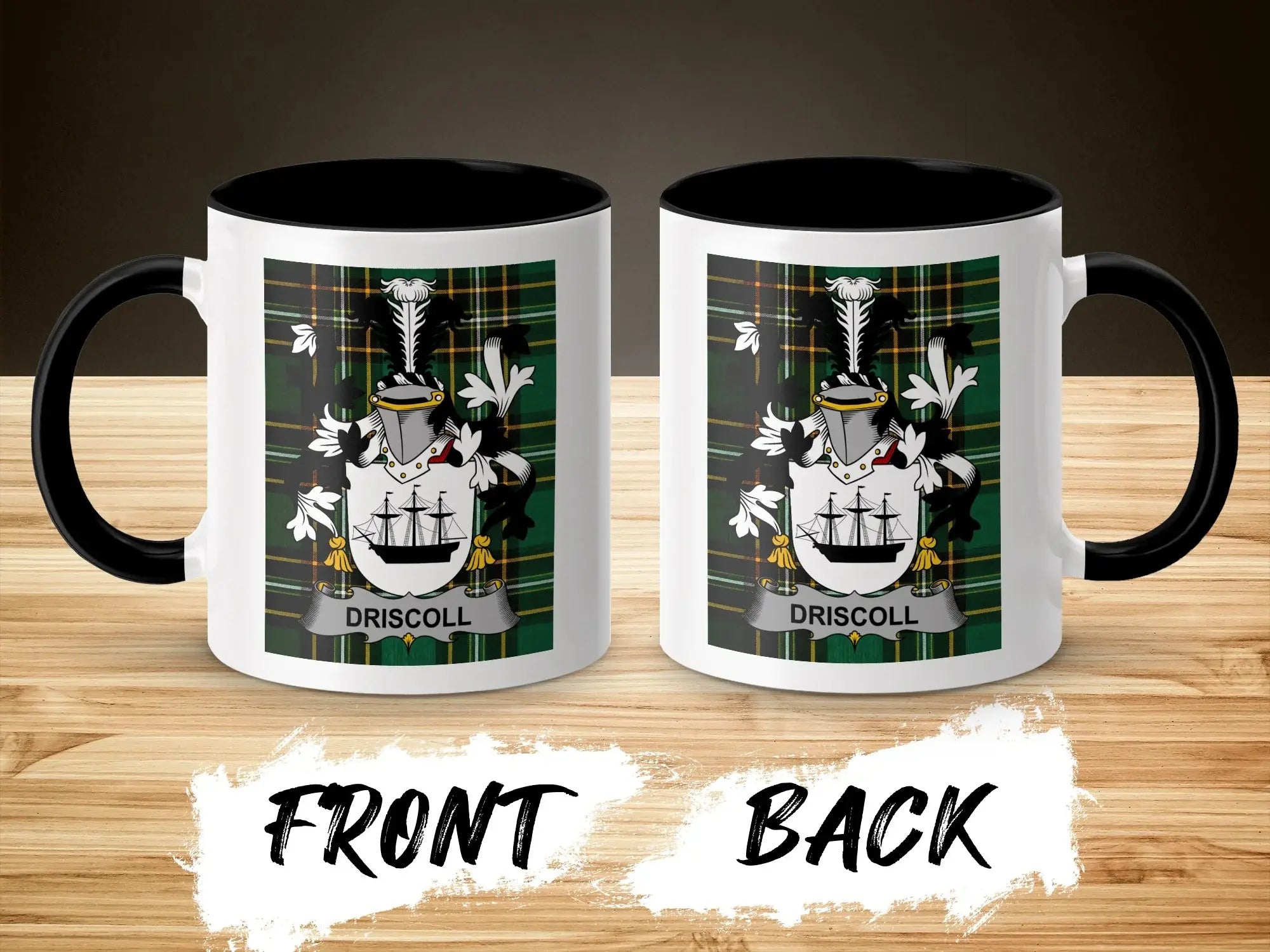Two views of a Driscoll family crest mug with black handle and rim.
