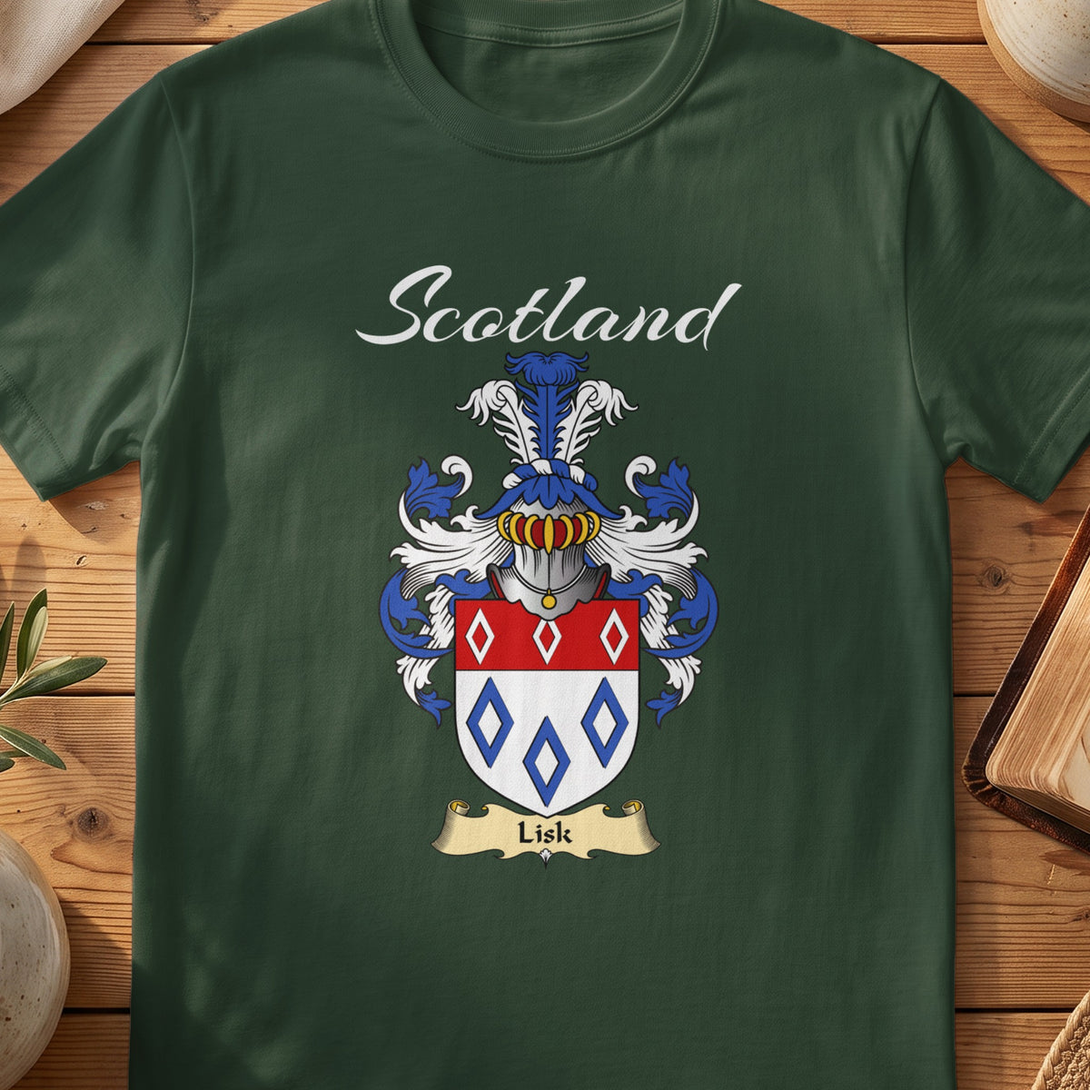Forest Green Lisk Scottish T-shirt featuring red-and-blue diamond outlines on a pale shield