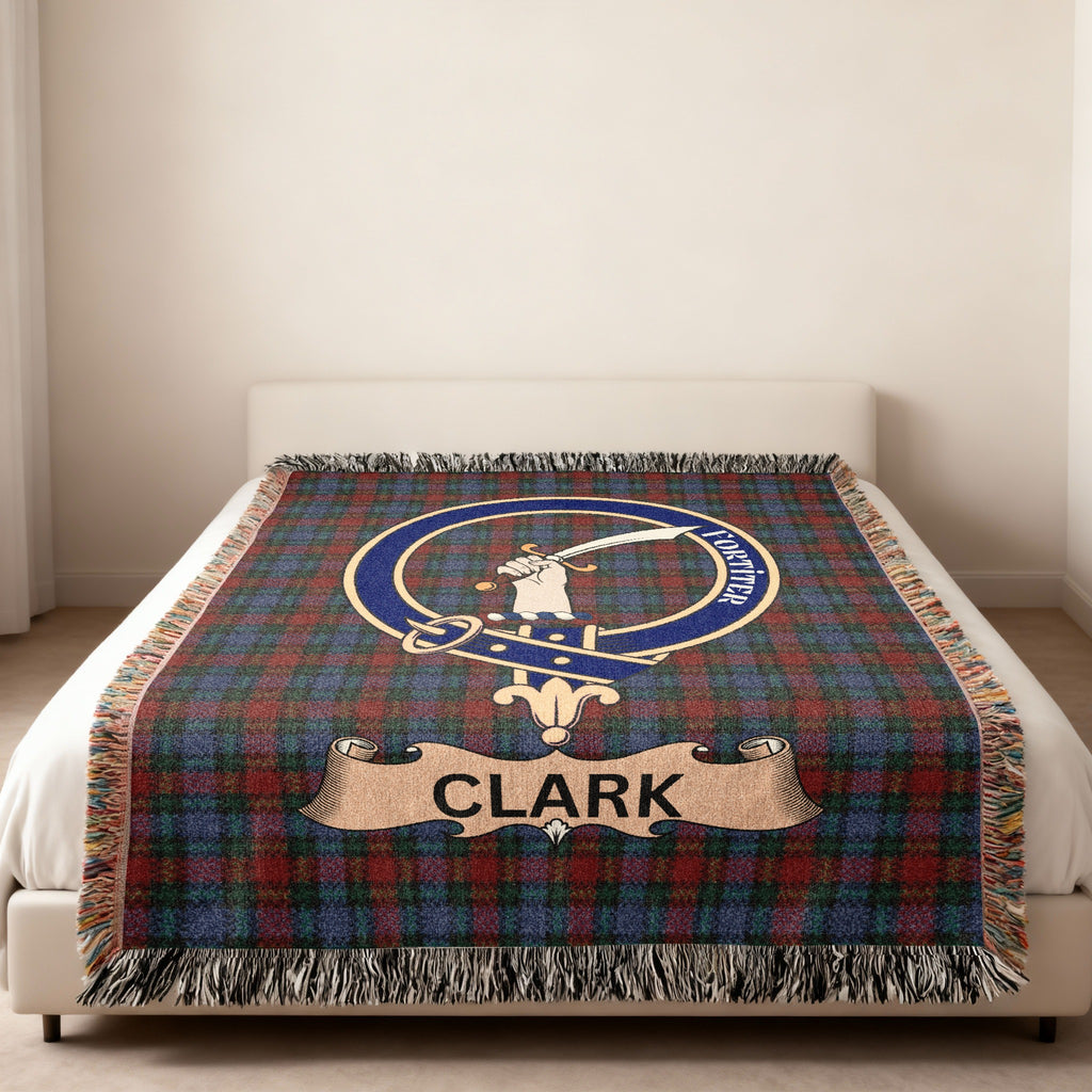 Clark family crest and name woven into tartan throw blanket
