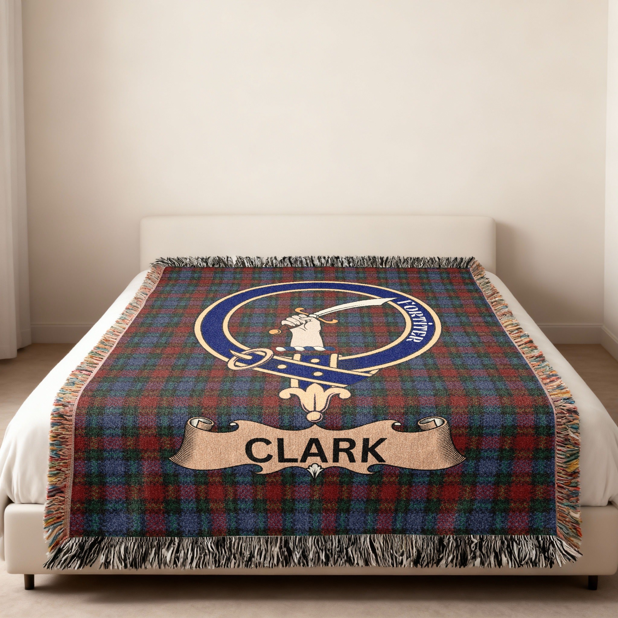 Clark family crest and name woven into tartan throw blanket