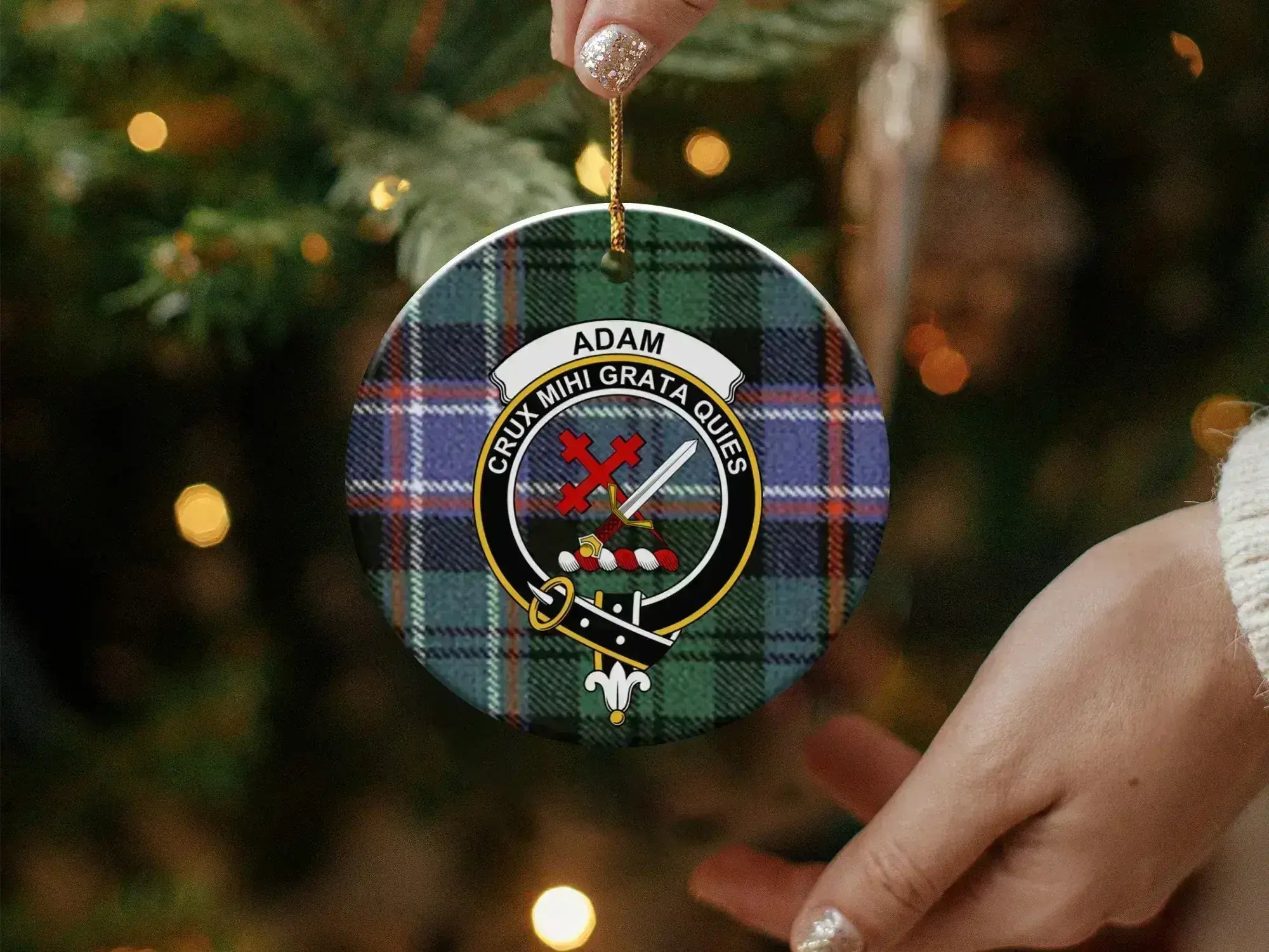 Adam ceramic ornament with gold hanging string