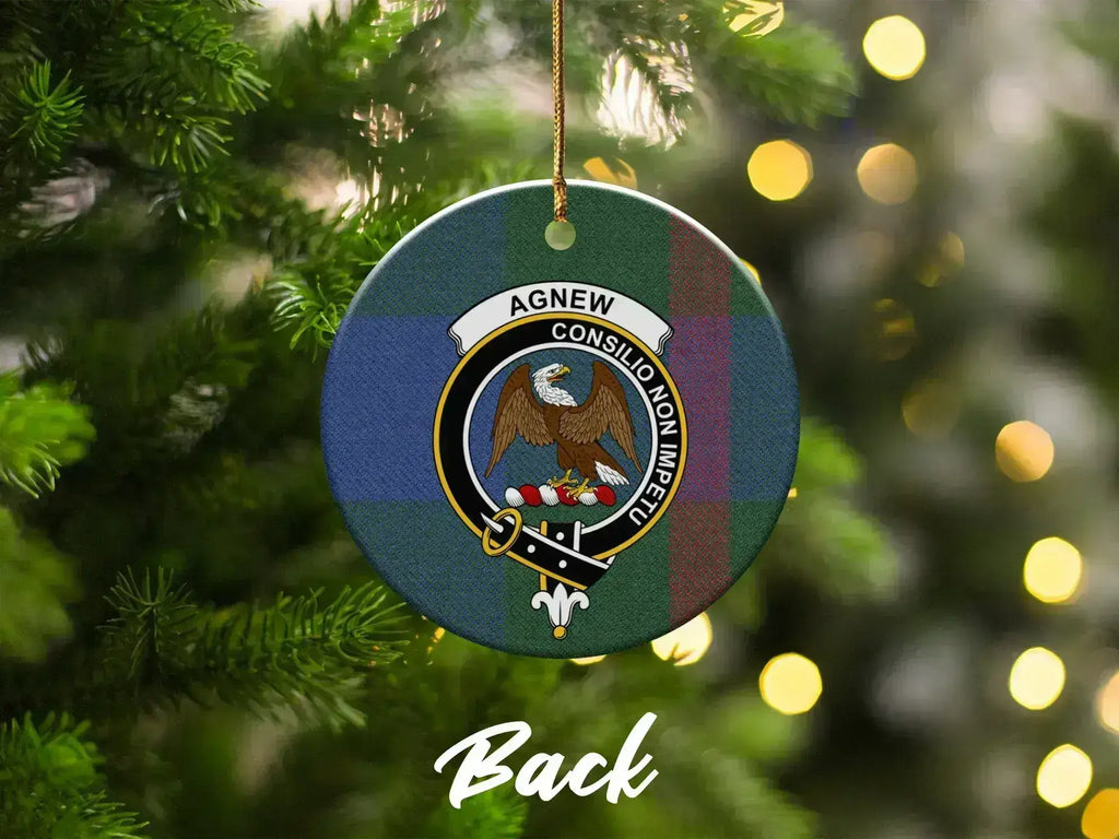 Agnew crest ornament hanging on a Christmas tree