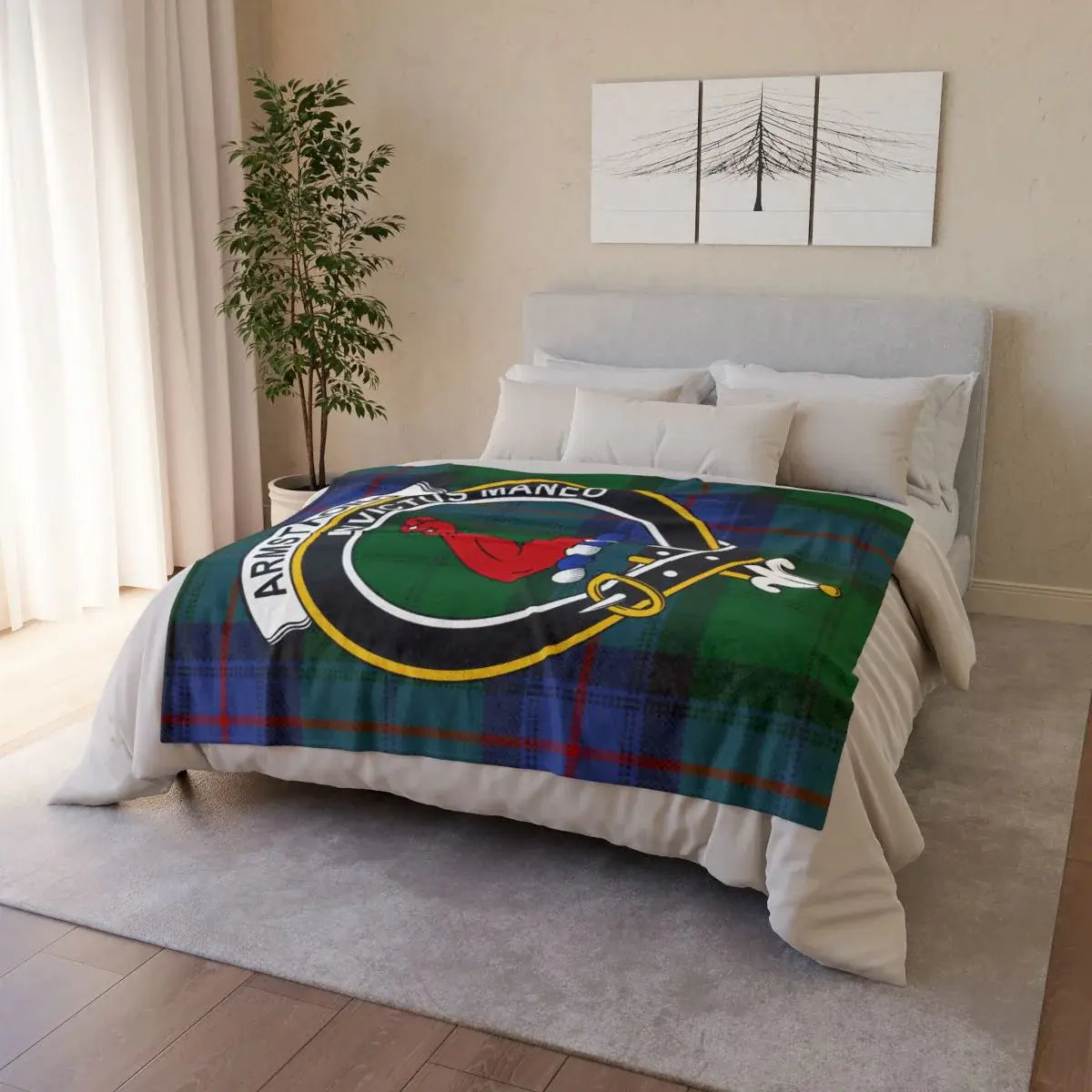 Armstrong tartan throw draped over sofa — lightweight printed clan crest blanket, 50x60