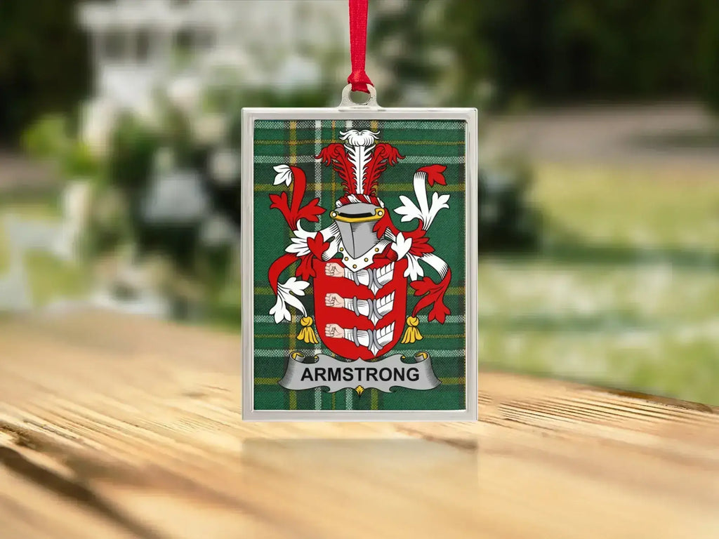 Armstrong coat of arms Irish tartan ornament on tree — polished metal frame, satin ribbon hanger