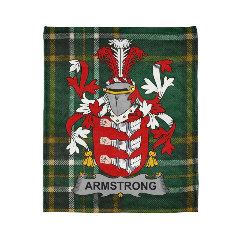 Armstrong family crest Irish tartan throw closeup — coat of arms on green and gold printed blanket